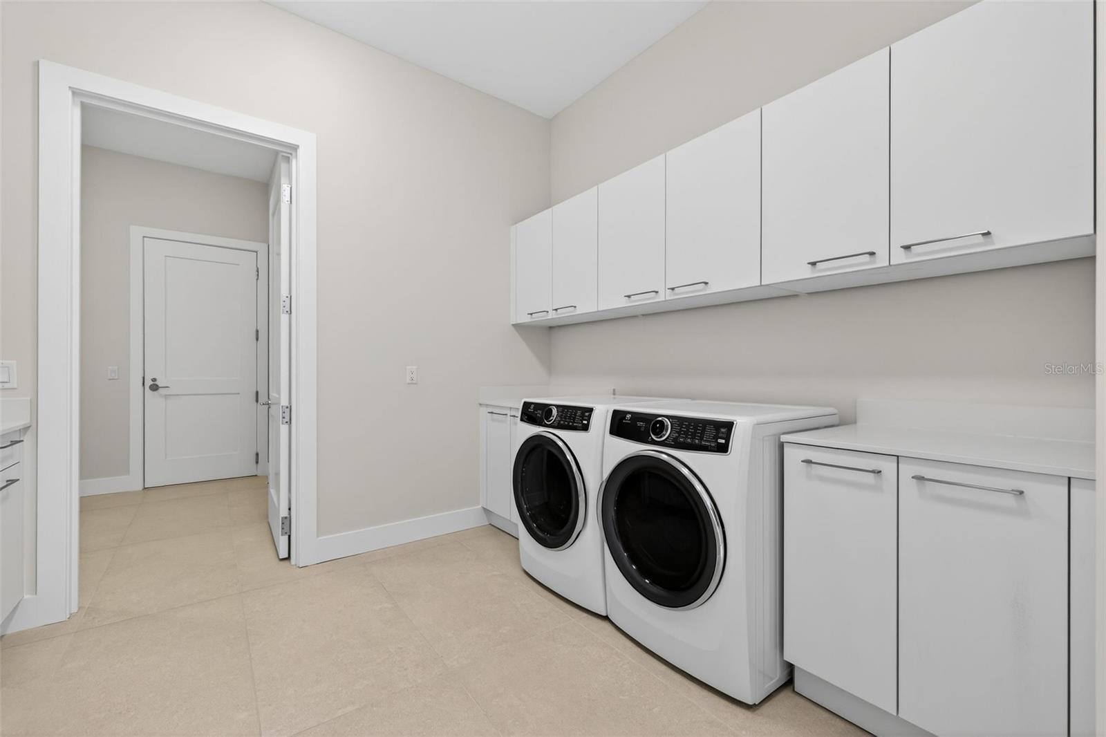 Laundry Room W/ Additional Mud Room and Access to Hall