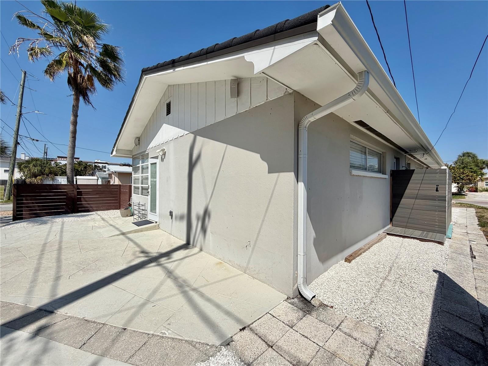 outdoor shower that leads to primary