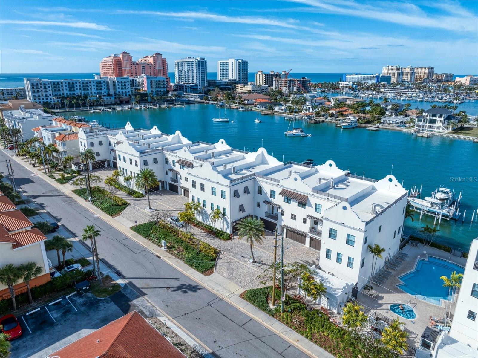 Brightwater Blue is a PREMIUM WATERFRONT COMMUNITY featuring an ONSITE SECURITY GUARD, RESORT STYLE POOL AND SPA, OUTDOOR ENTERTAINING AREA WITH GAS GRILLS and a BEACH RINSE OFF STATION.