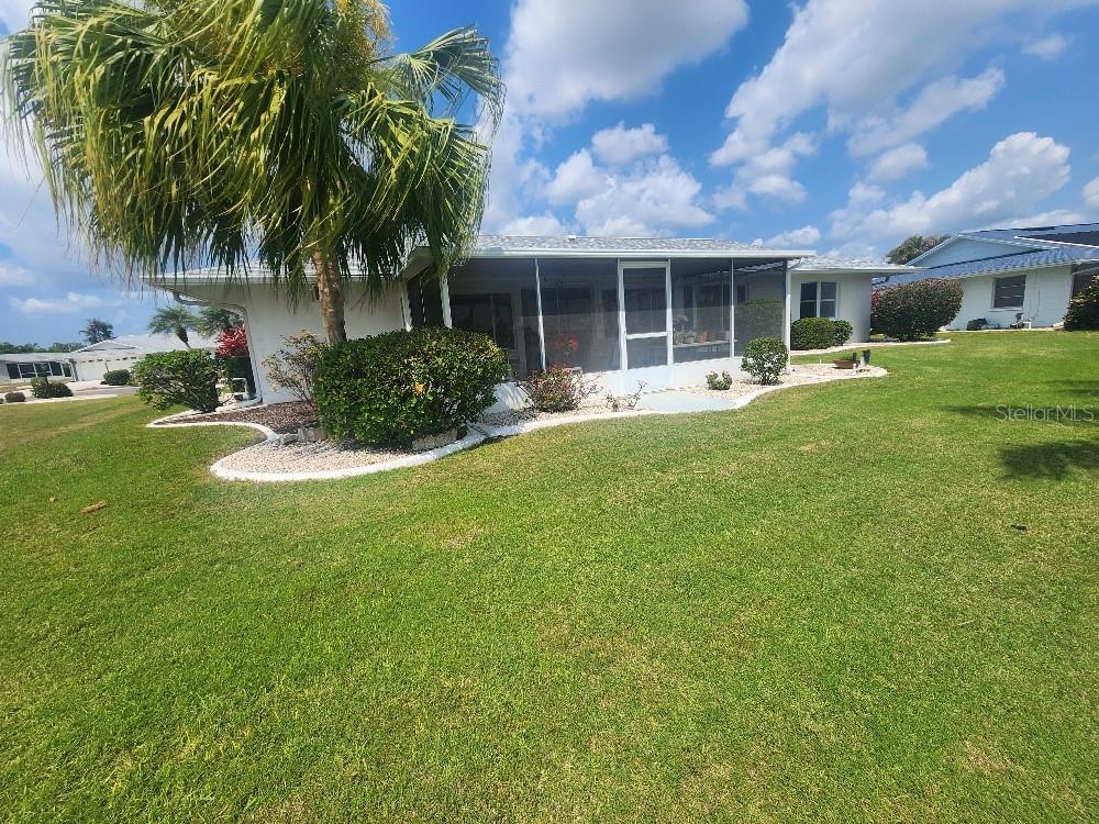 rear view of house showing screen porch