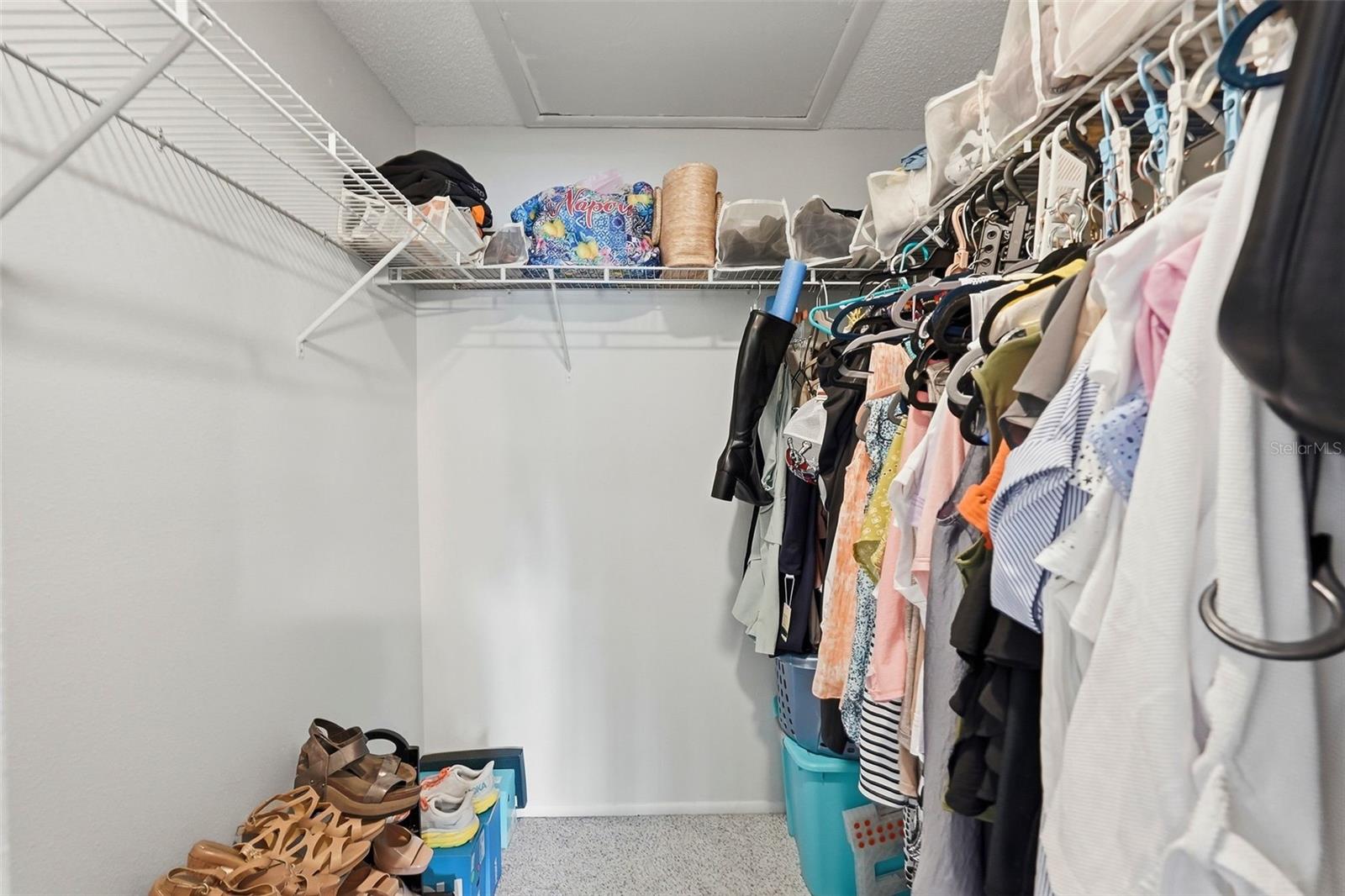 upstairs bedroom walk in closet