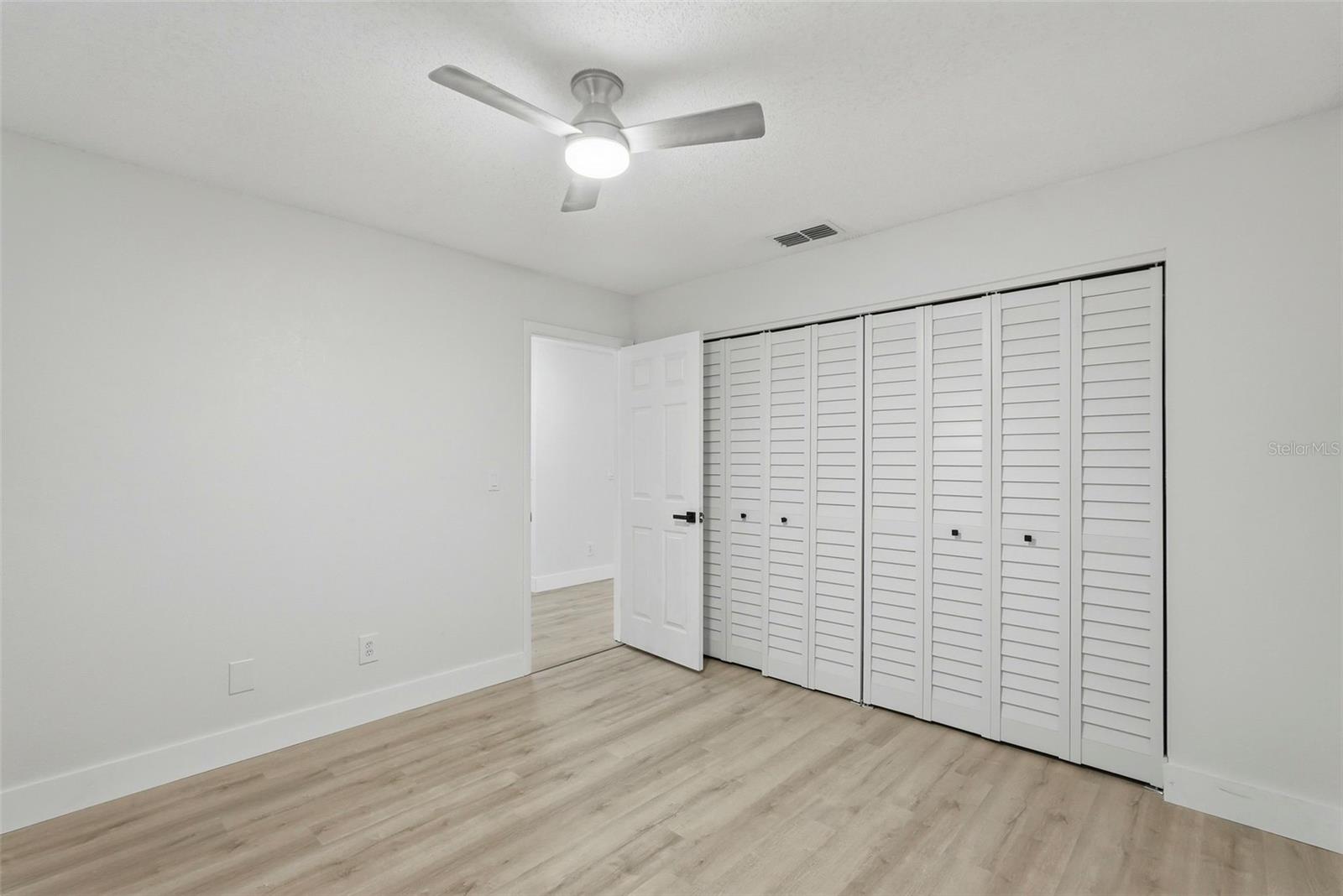 2nd bedroom features 2 double closets