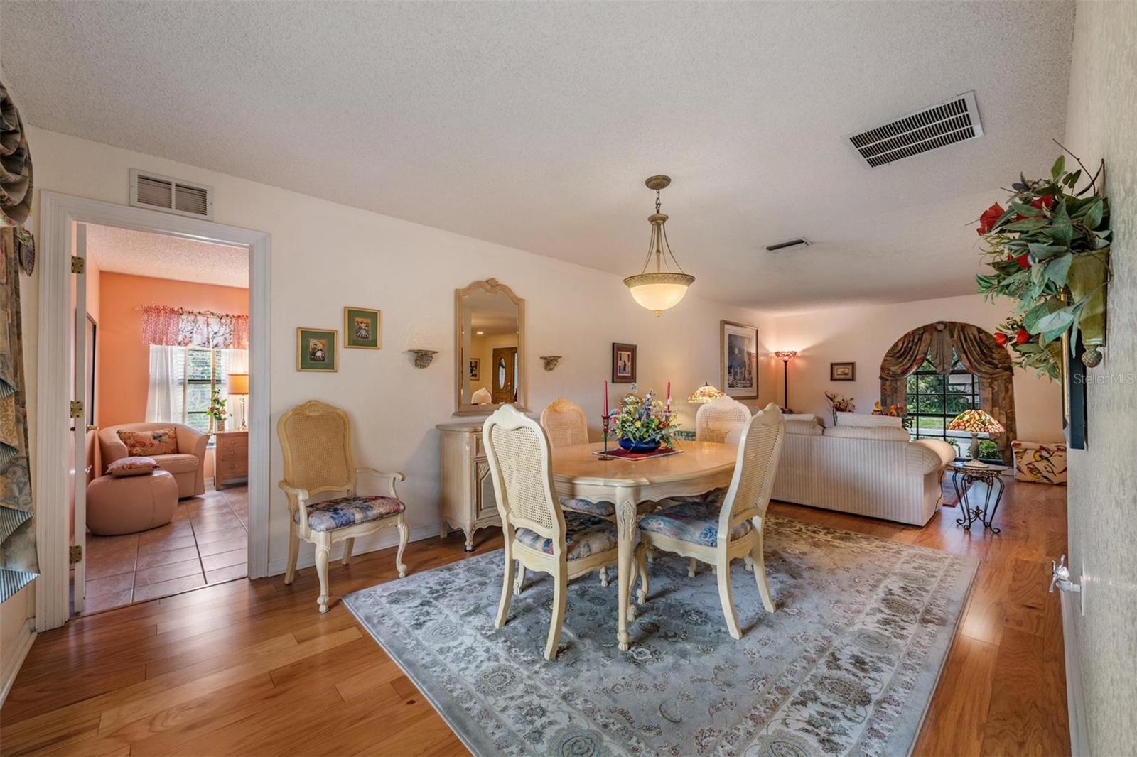 Dining room to living room and primary bedroom