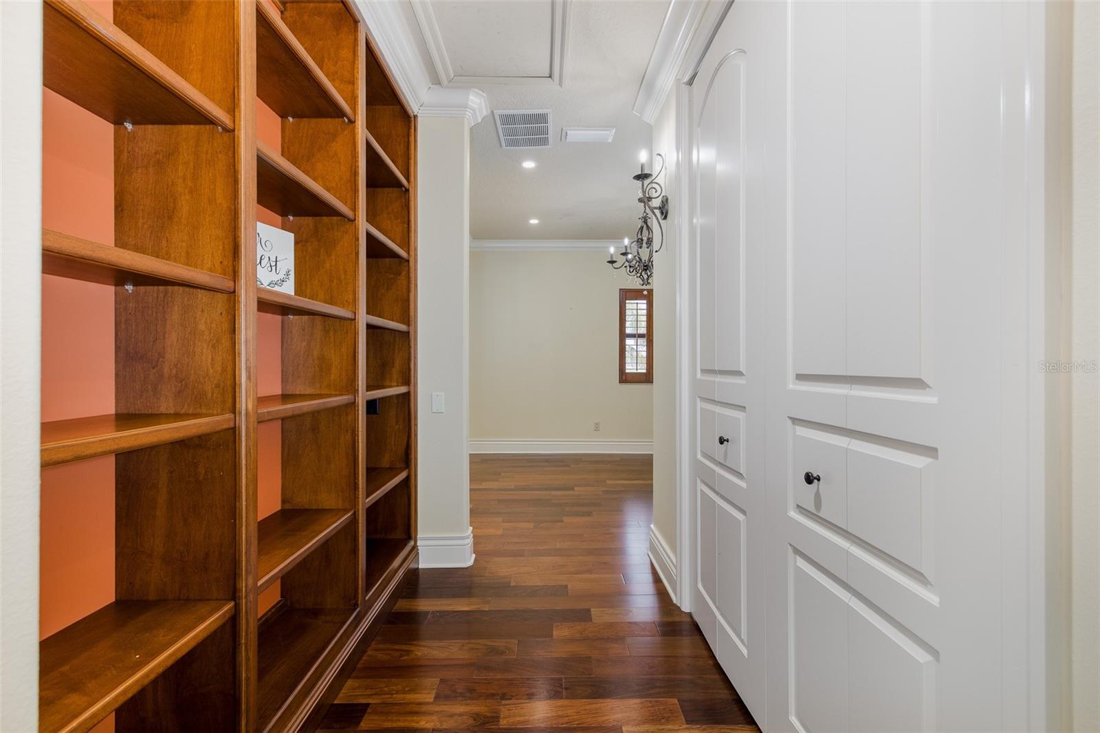 Upstairs Hallway w/Bookcases & Closets