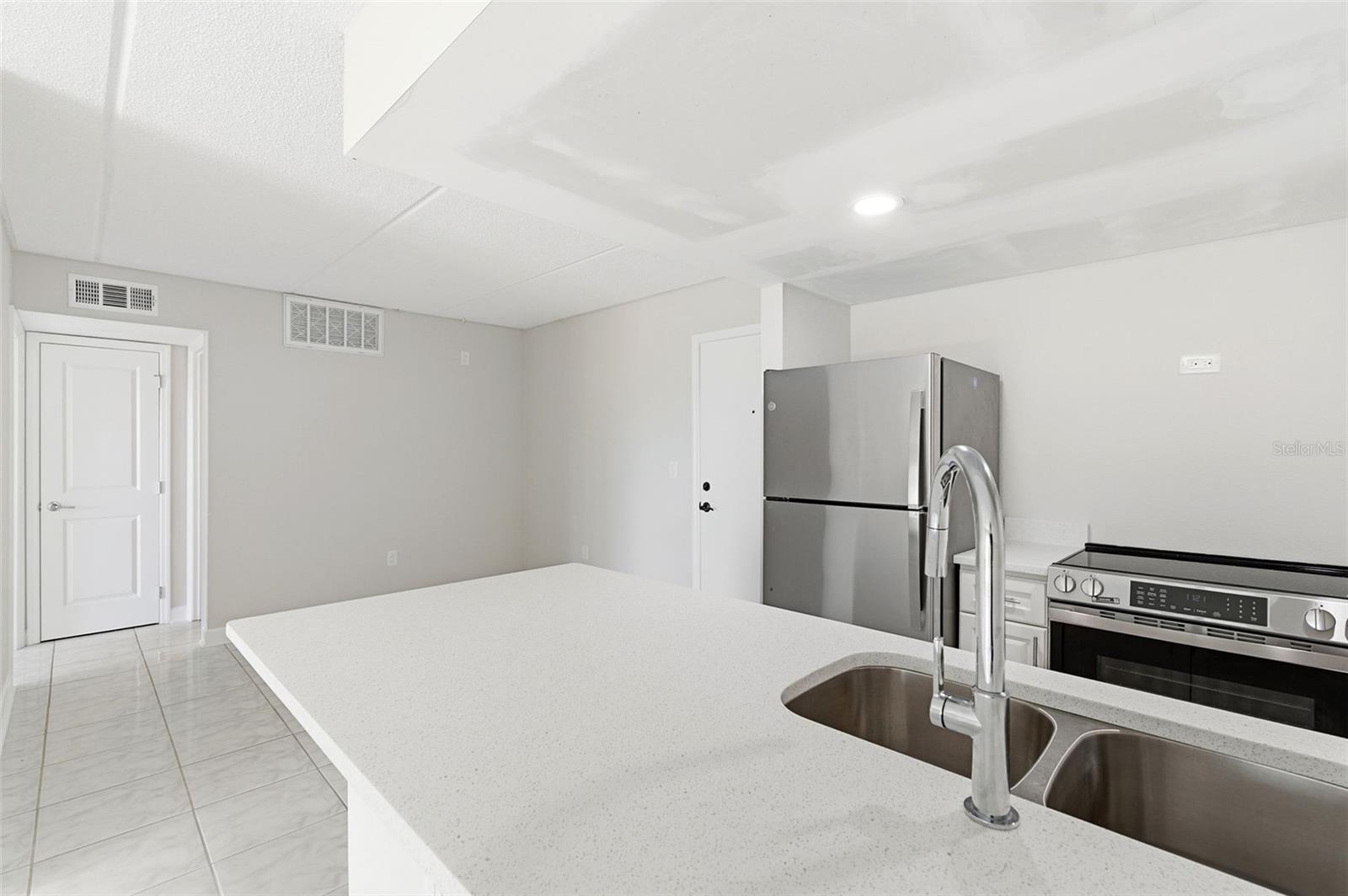 Kitchen and dining area to the left