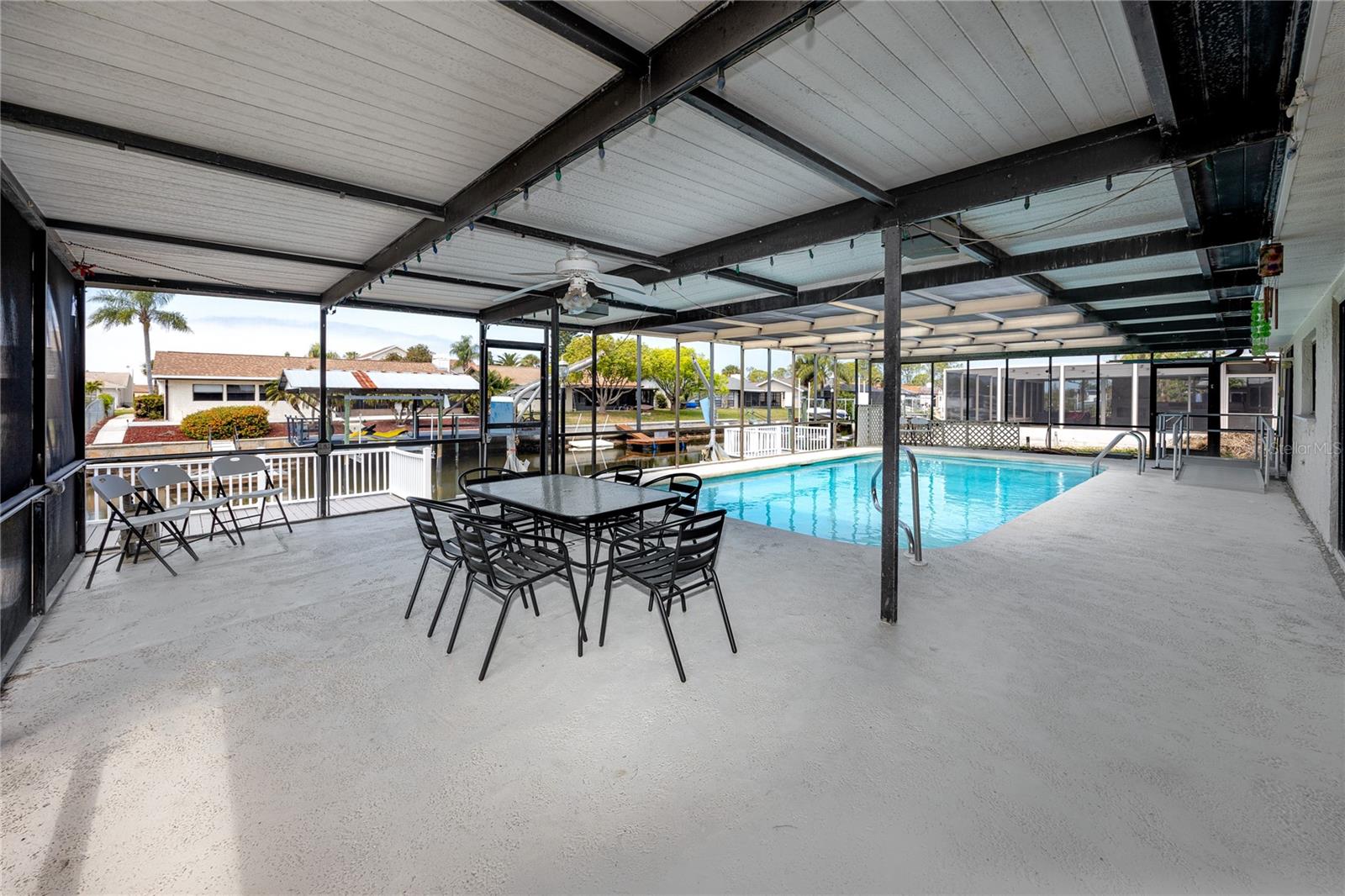 Covered Patio/lanai   and Pool at 9903 San Mateo Way, Port Richey, FL 34668