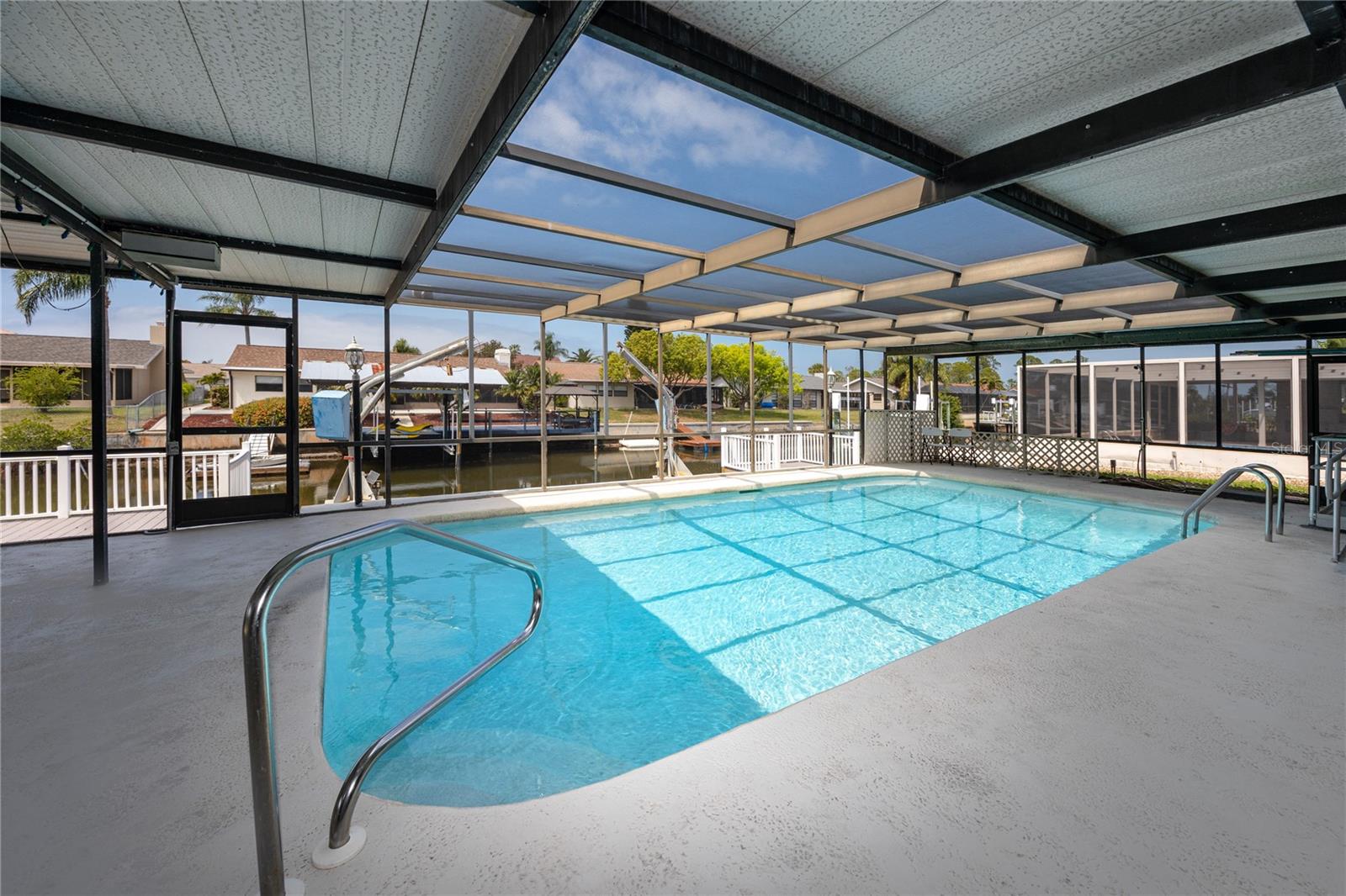 Covered Patio/lanai   and Pool at 9903 San Mateo Way, Port Richey, FL 34668