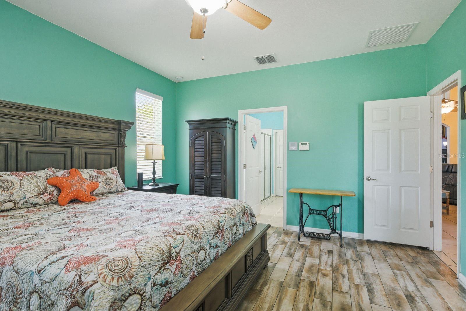 Primary Suite with Sliders to the Pool