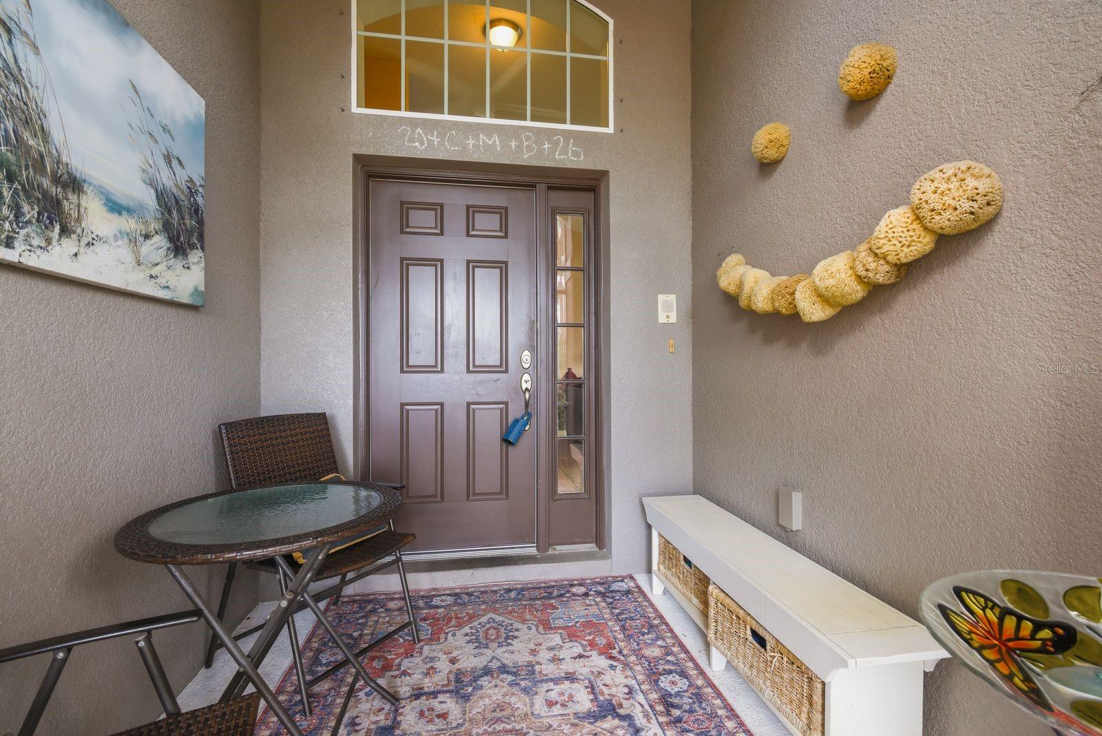 Screened in Front Porch with Ceiling Fan and Plenty of Room for Morning Coffee!
