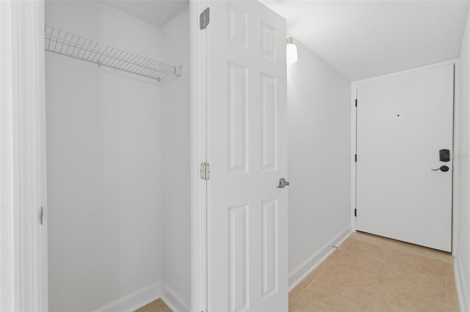 A nice coat closet in the hallway