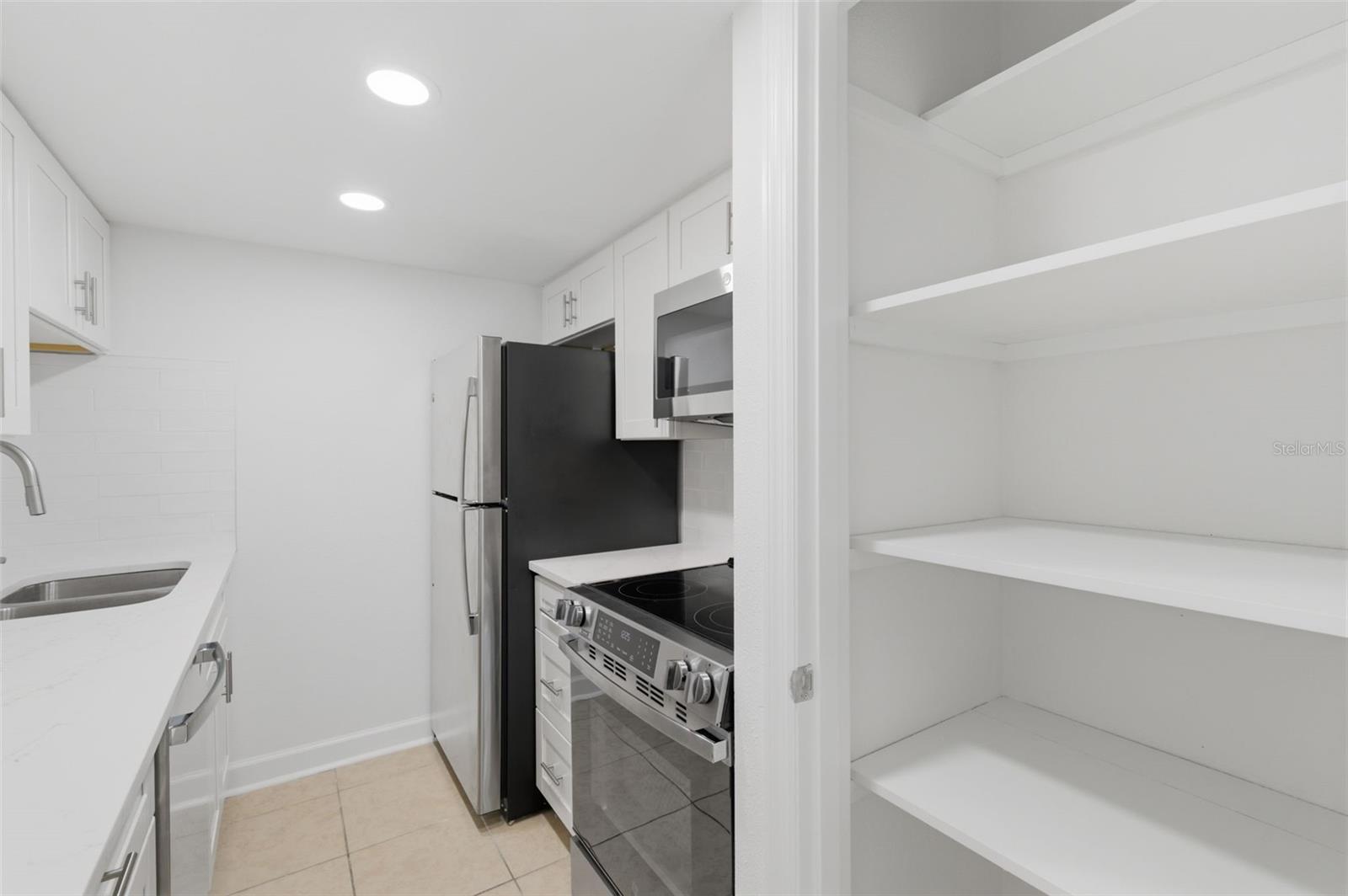 Nice shelved pantry for storing groceries and small appliances