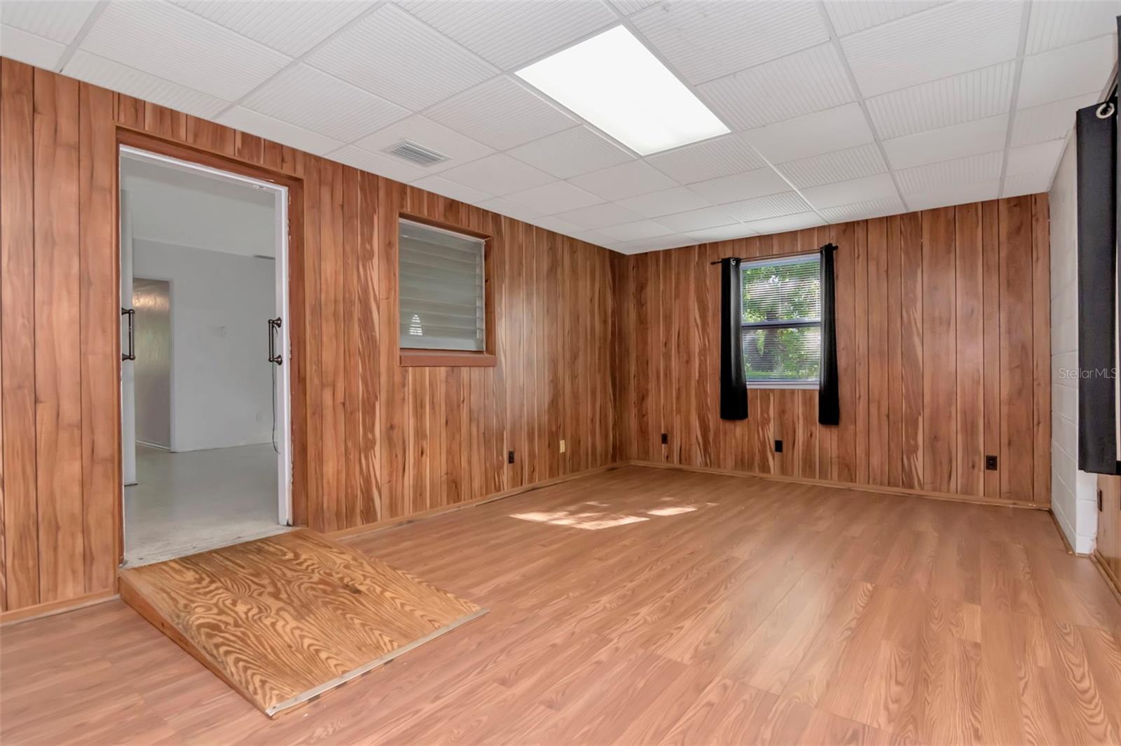 Bonus Room can be a bedroom of a family room.  Currently has a ramp to enter the kitchen area.