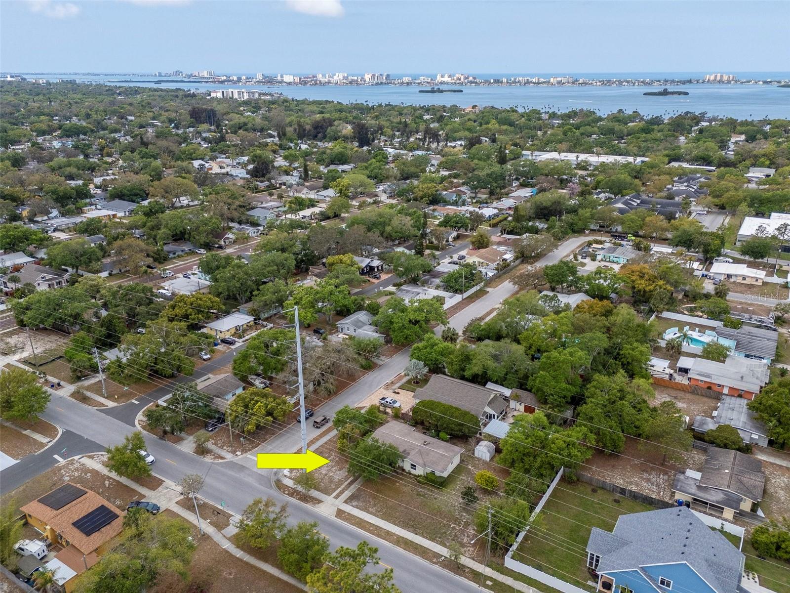 Aerial view of the front of lot.  Dunedin waterfront and Clearwater beach in the background.