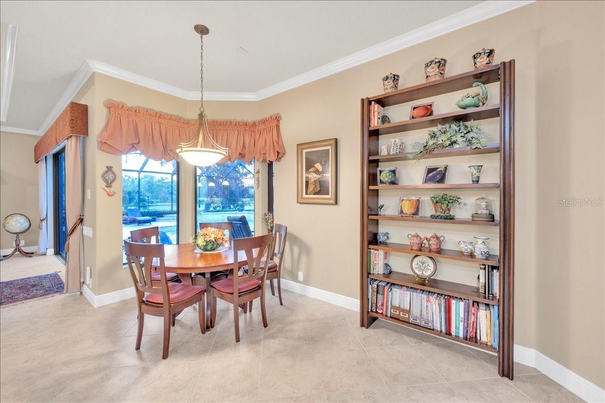 Dining room features french doors leading to the lanai.
