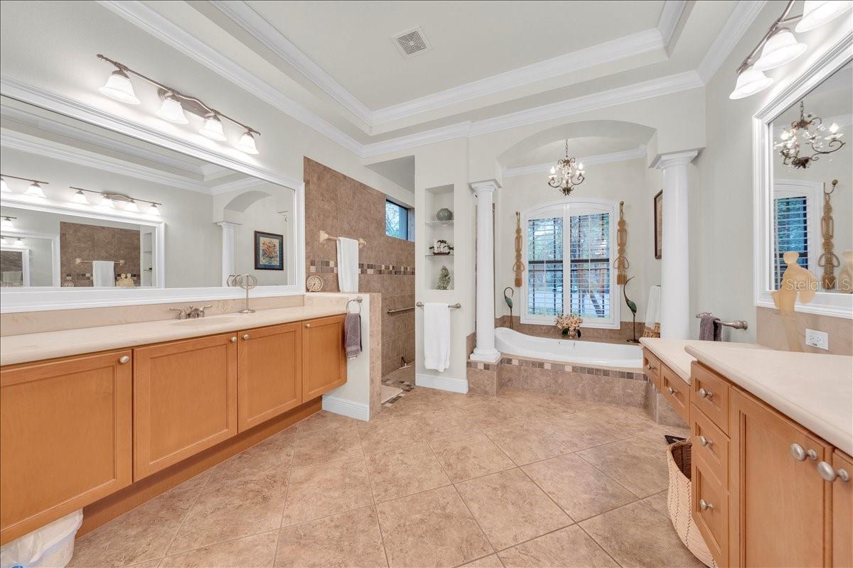 En-suite bathroom with dual vanities.