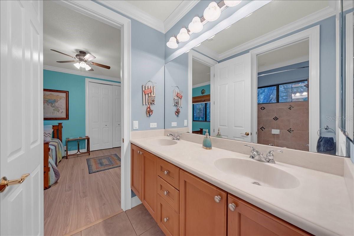 Convenient shared bathroom between two bedrooms.