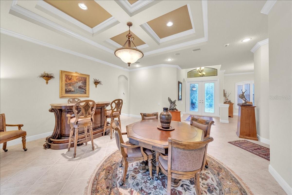 Enter through the front doors into an open foyer with volume ceiling!