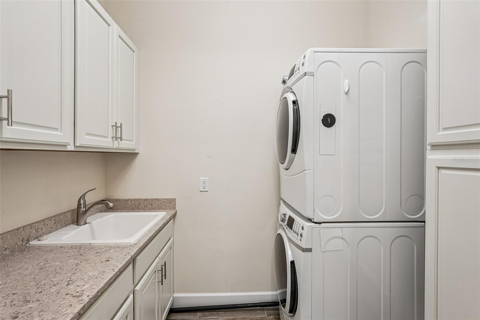 Landry with Built-in Cabinets and Sink