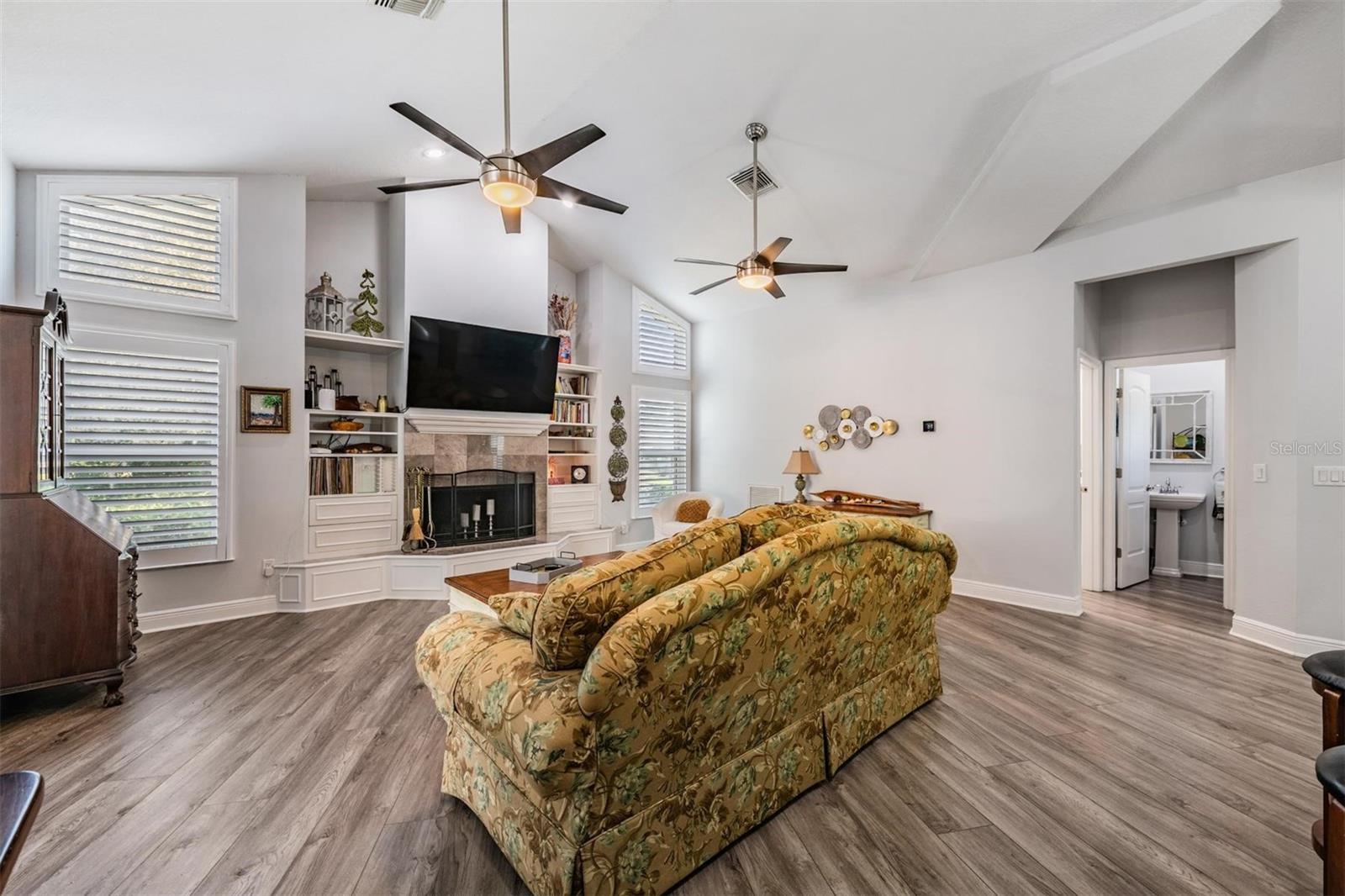 Family room with 1/2 bath and laundry room to the right
