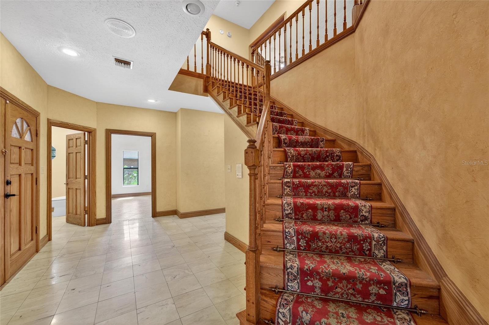 Elegant staircase leads you to the second level