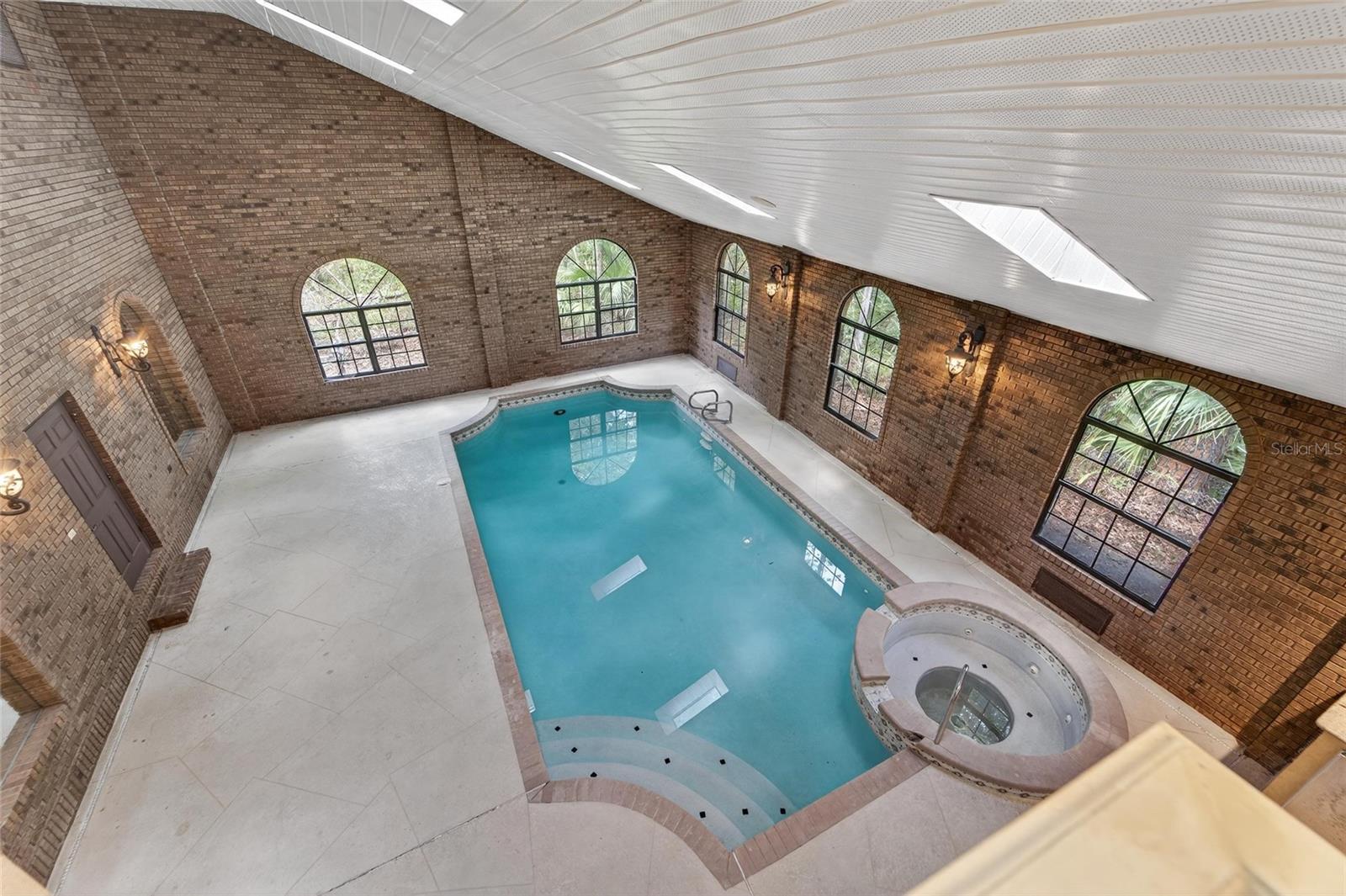 Breathtaking view of indoor pool & spa