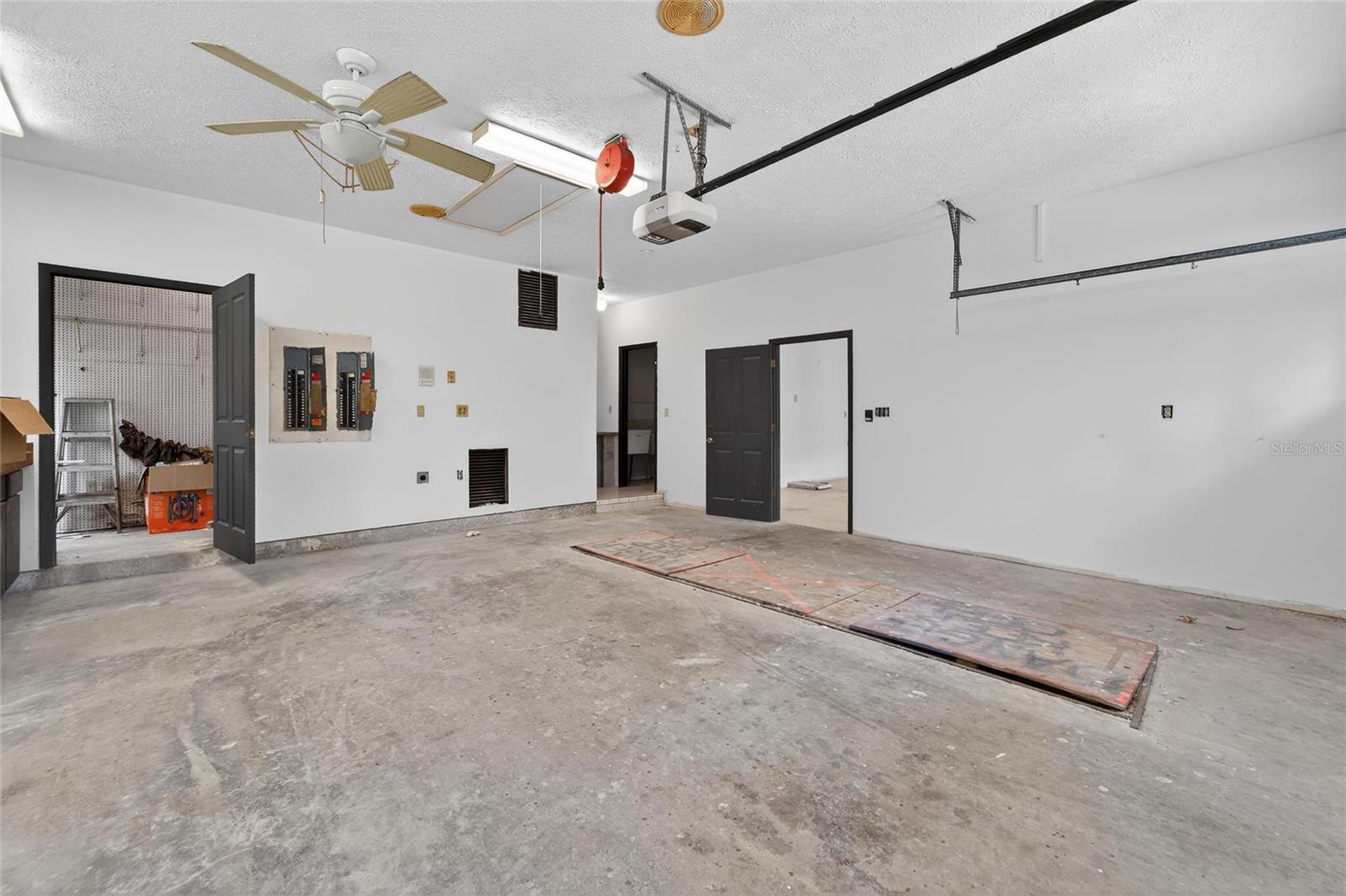 Second set of 2-car garage with workshop & Mechanic Pit (easily service your vehicle at home)