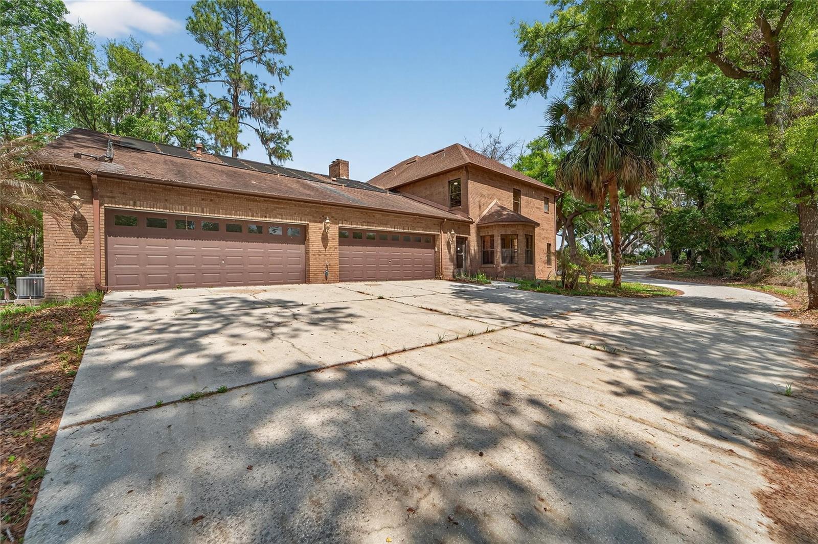 Side-entry 4-car garage with oversized parking