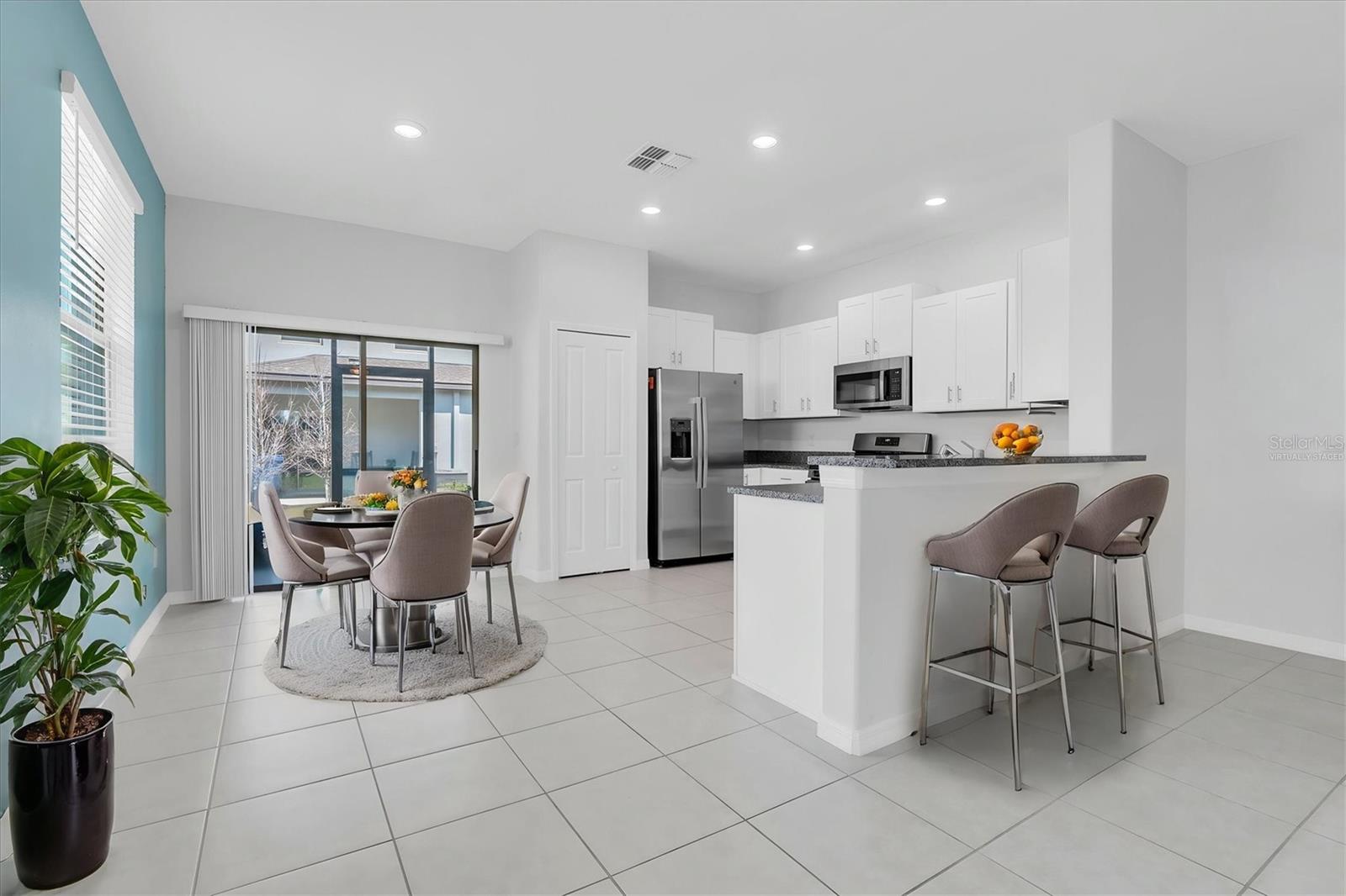 Kitchen/ dining area, virtually staged