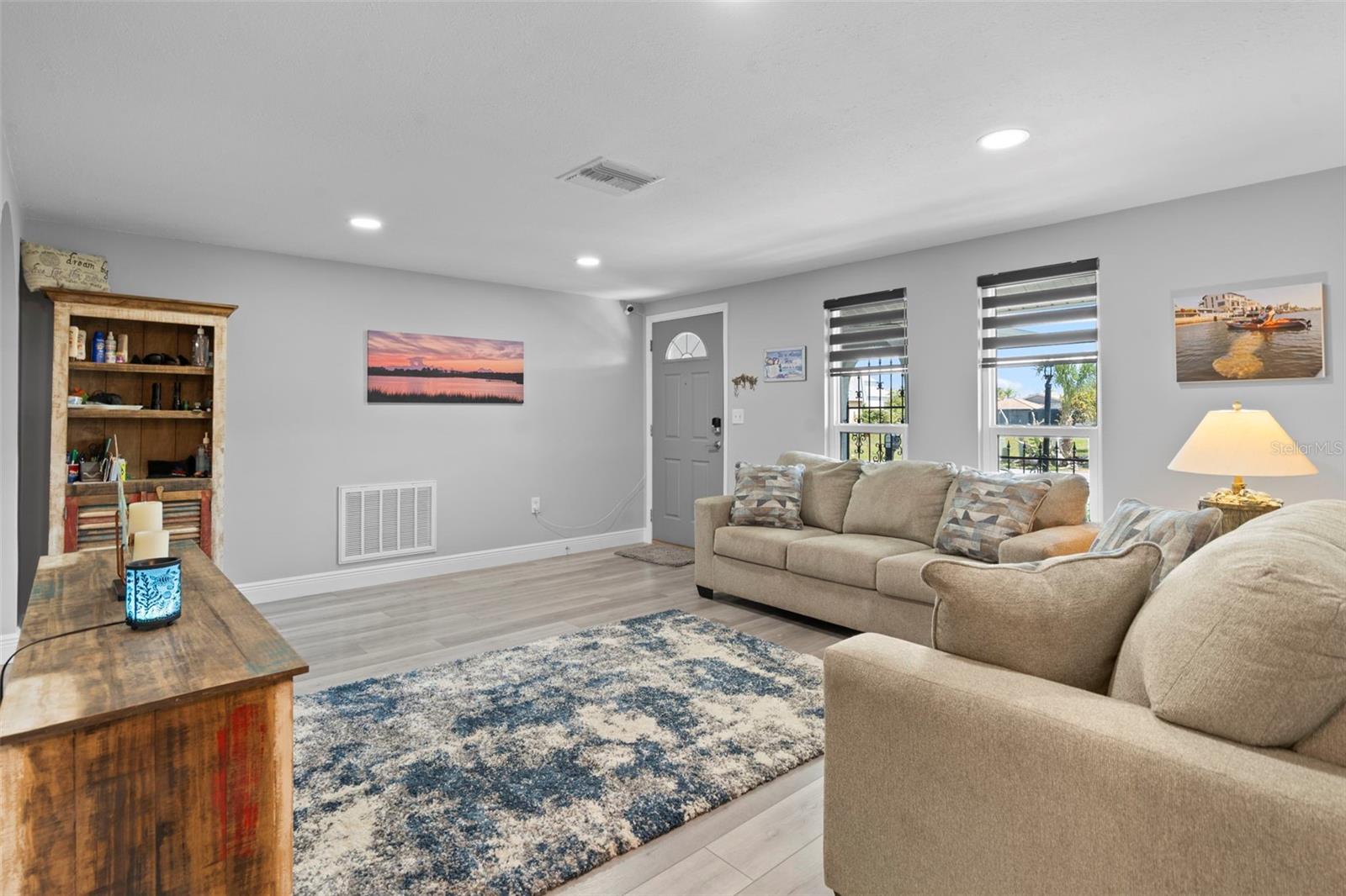 Formal Living Room with NEW Flooring and Custom Blinds