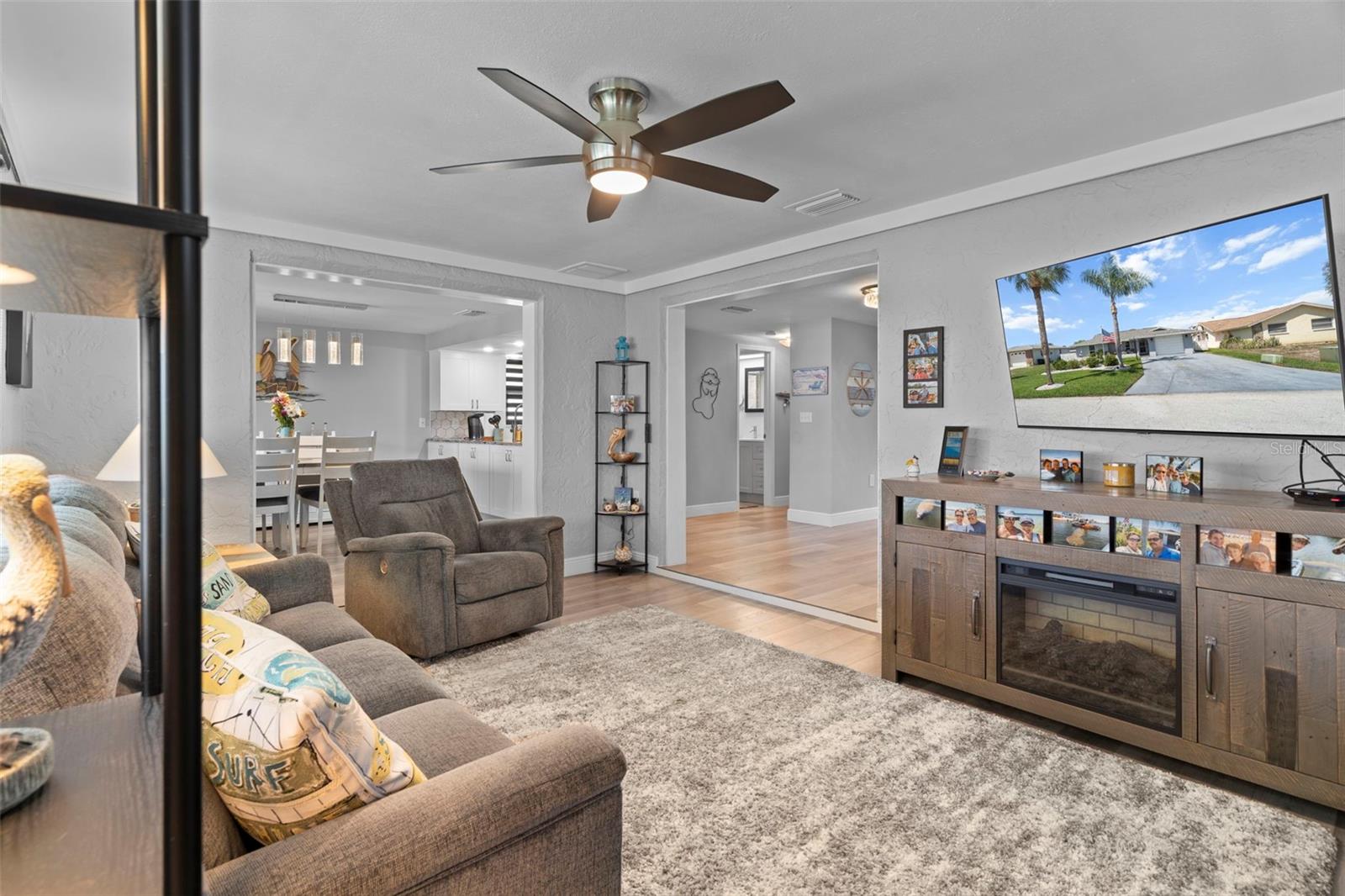 Family Room with NEW Flooring Overlooking Canal