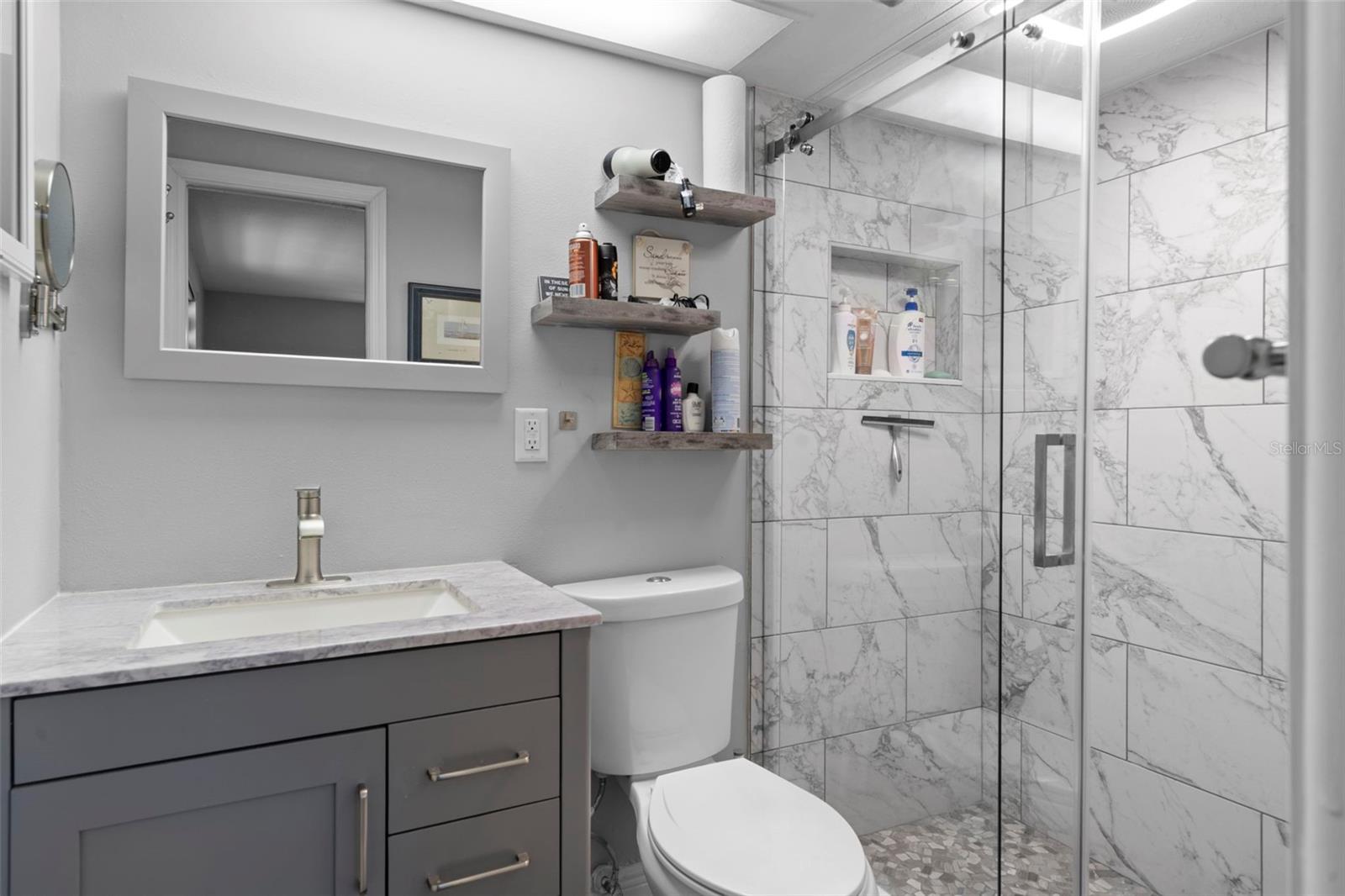 Primary Bath with NEW Vanity, NEW Toliet, NEW Tiled Shower