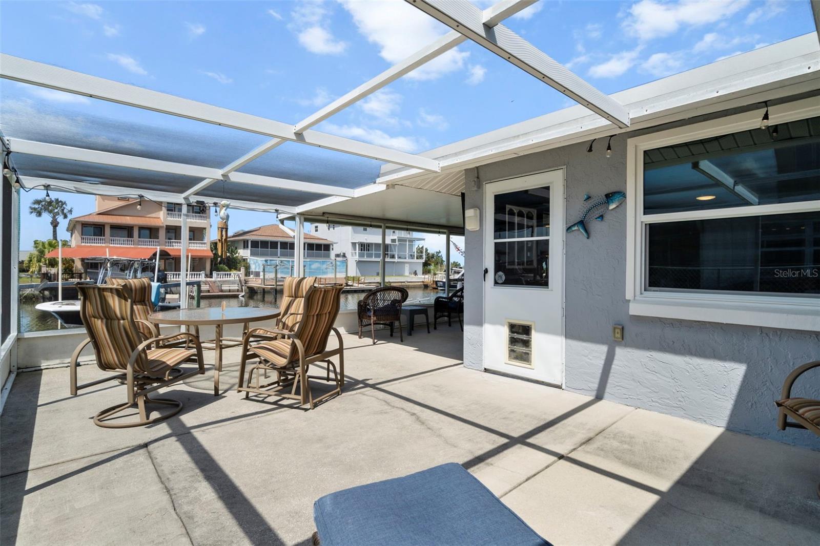 Spacious Screened Lanai Overlooking Canal