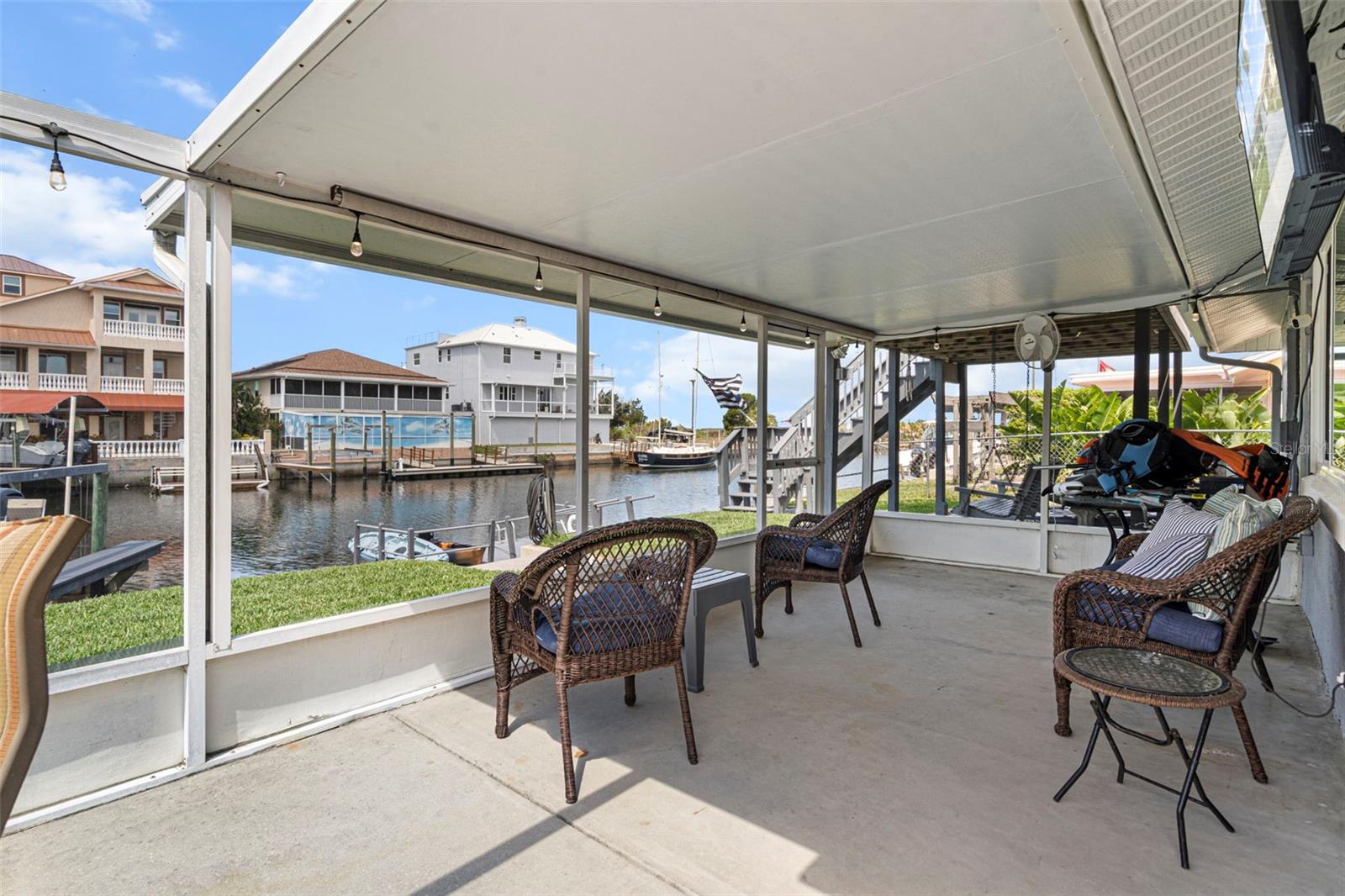 Spacious Covered Screened Lanai Overlooking Canal