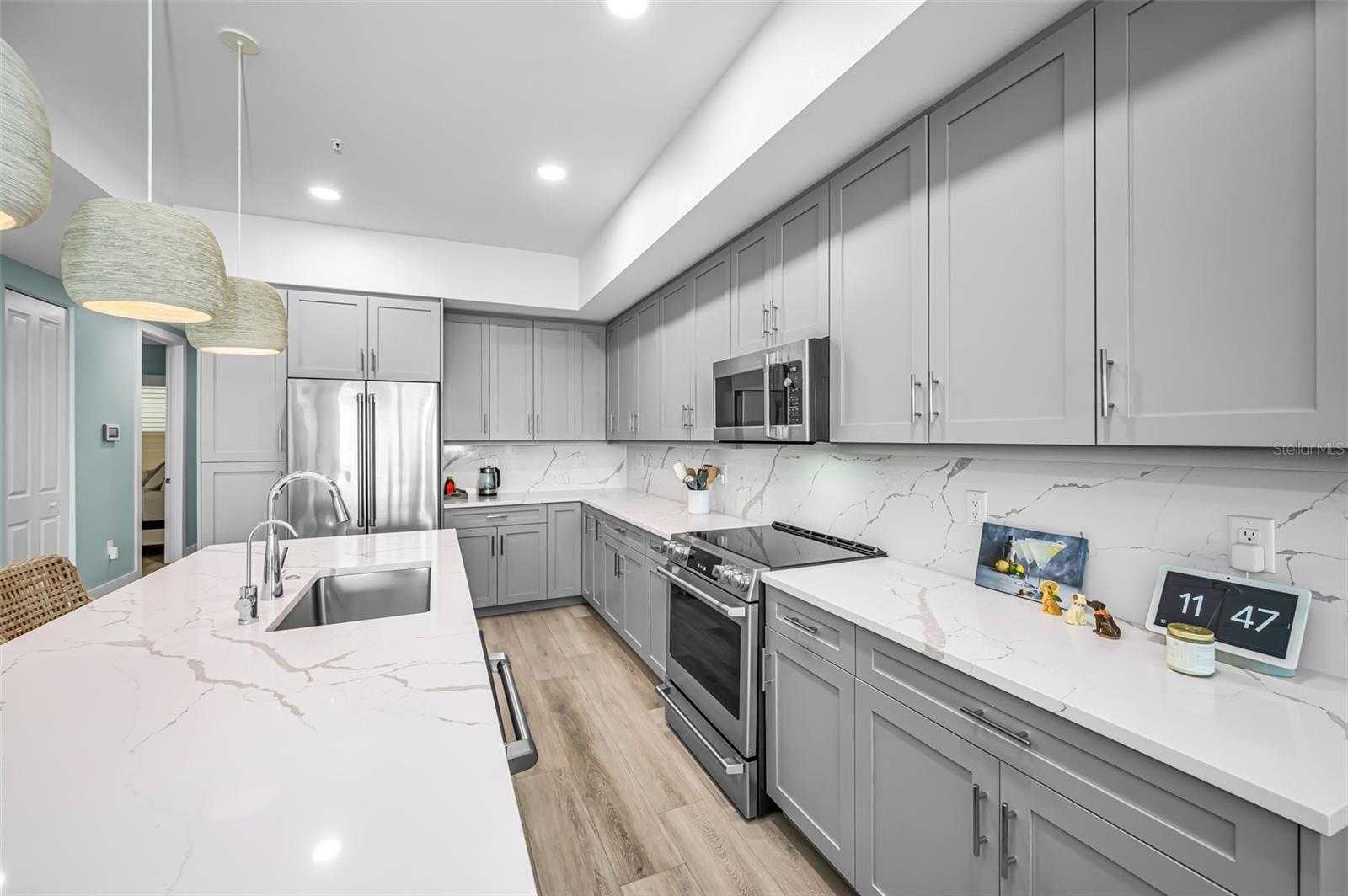 Sleek, design-forward kitchen with Coastal finishes!