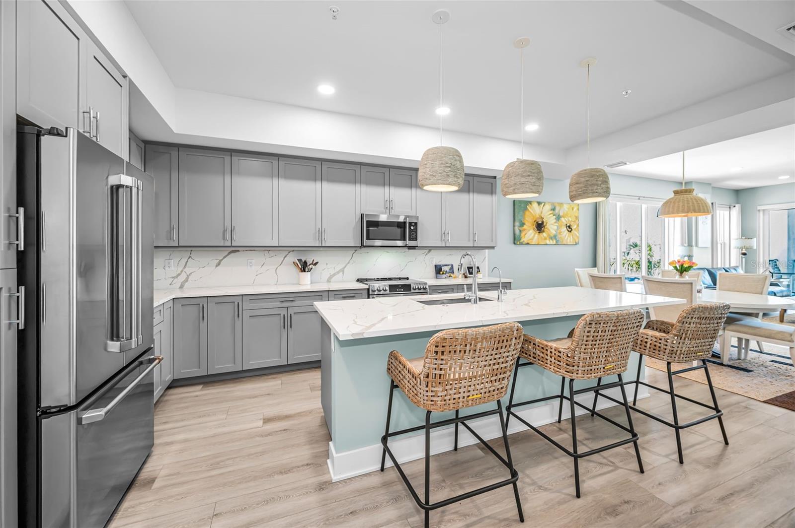 Sophisticated modern chef’s kitchen with a large Social Island