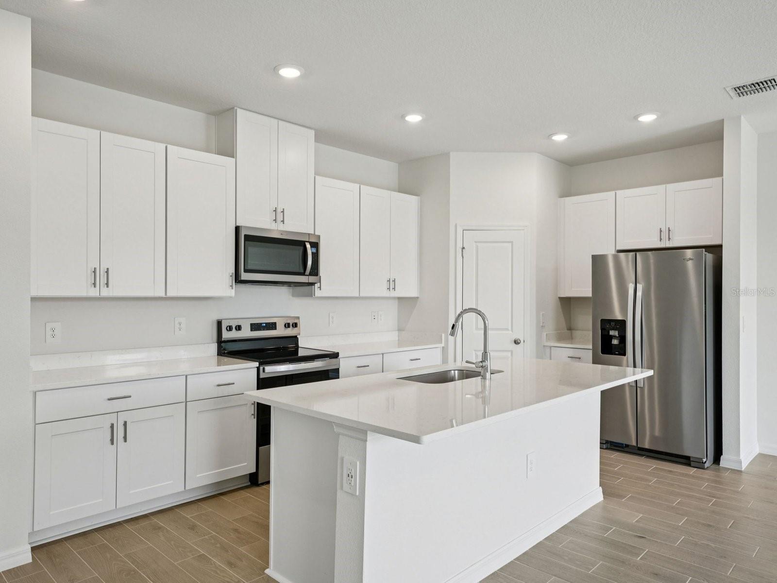 Photo is not of the actual home, but is an inspirational photo of builder’s model home and may depict options, furnishings, and/or decorator features that are not included