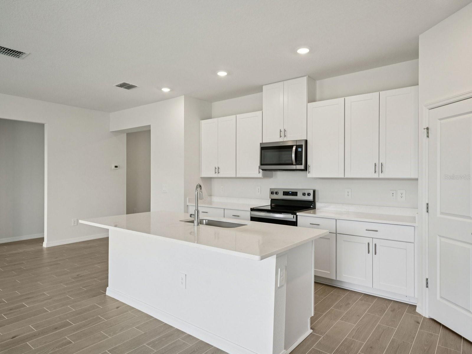 Photo is not of the actual home, but is an inspirational photo of builder’s model home and may depict options, furnishings, and/or decorator features that are not included