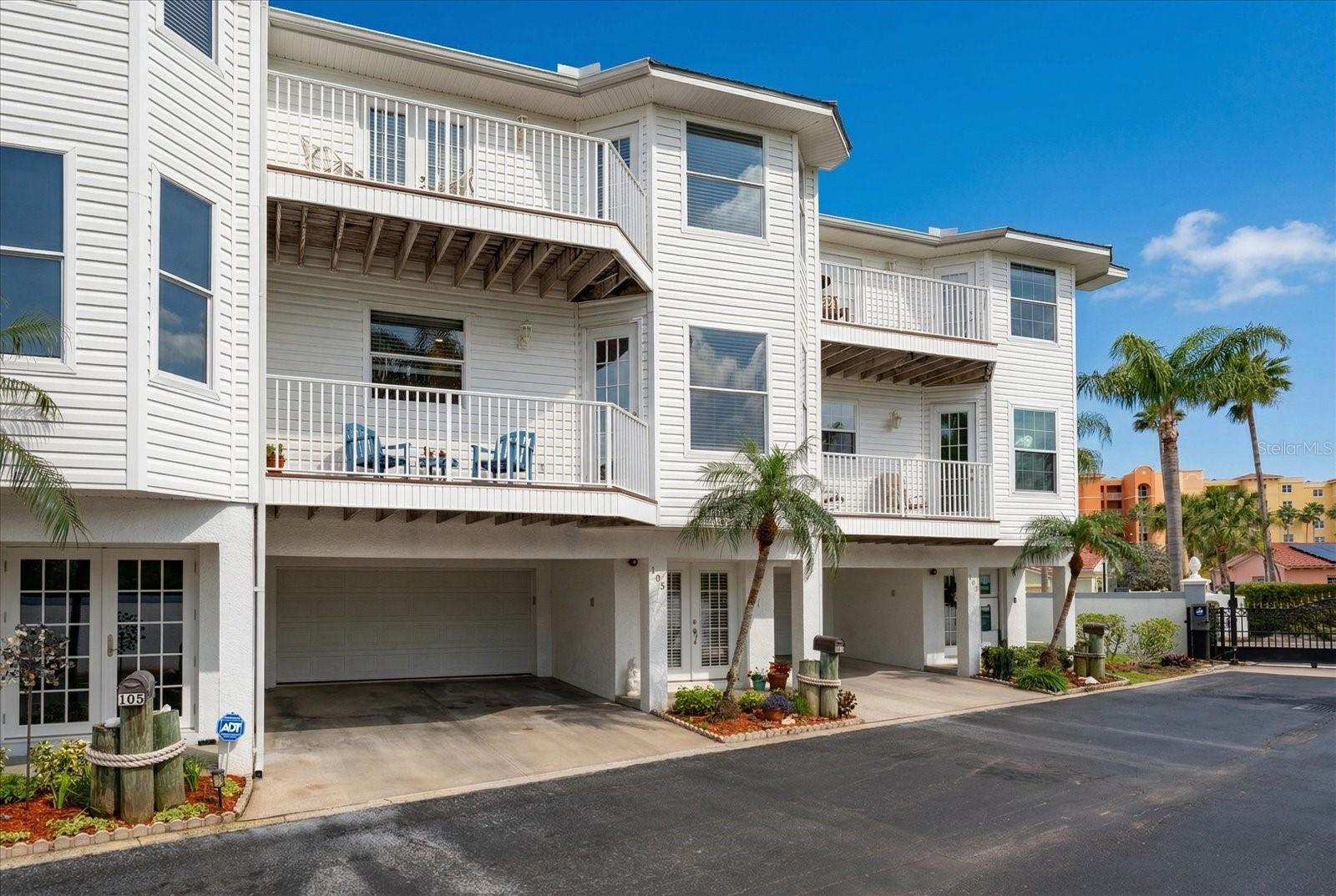 Worry-free, living at its best in this elevated townhouse, providing maintenance free living in the lovely gated community of The Shoals at Tides Village.