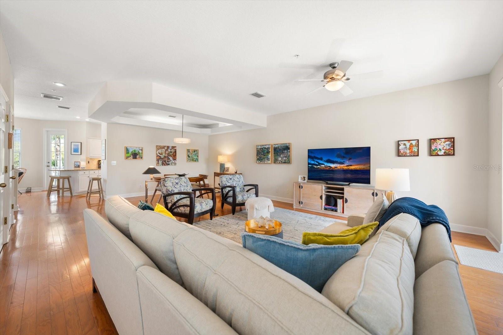 The great room located on the main living level offers an exceptional layout, perfect for entertaining and gathering.