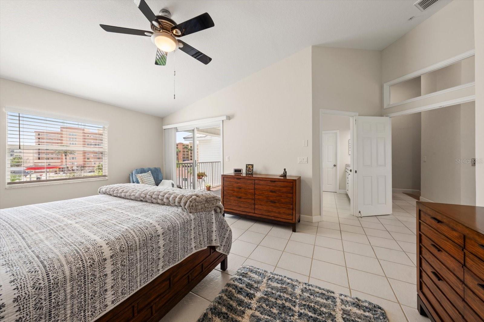 Abundant natural light engulfs the primary suite.