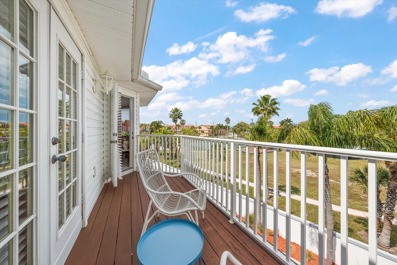 One of several balconies in the home, this shared balcony provides peek-a-boo views of the Intracoastal.
