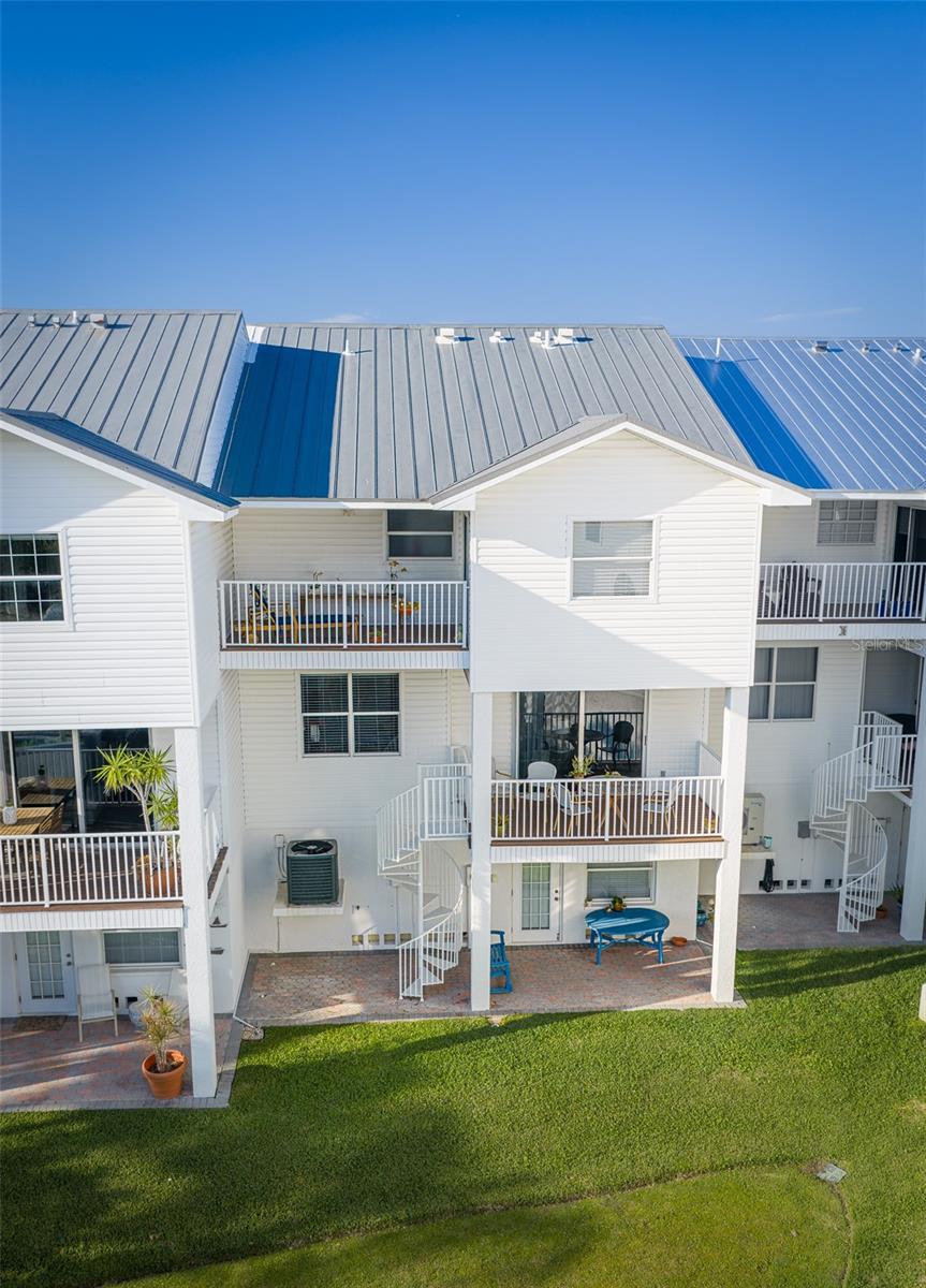 Multiple outdoor living areas provided.