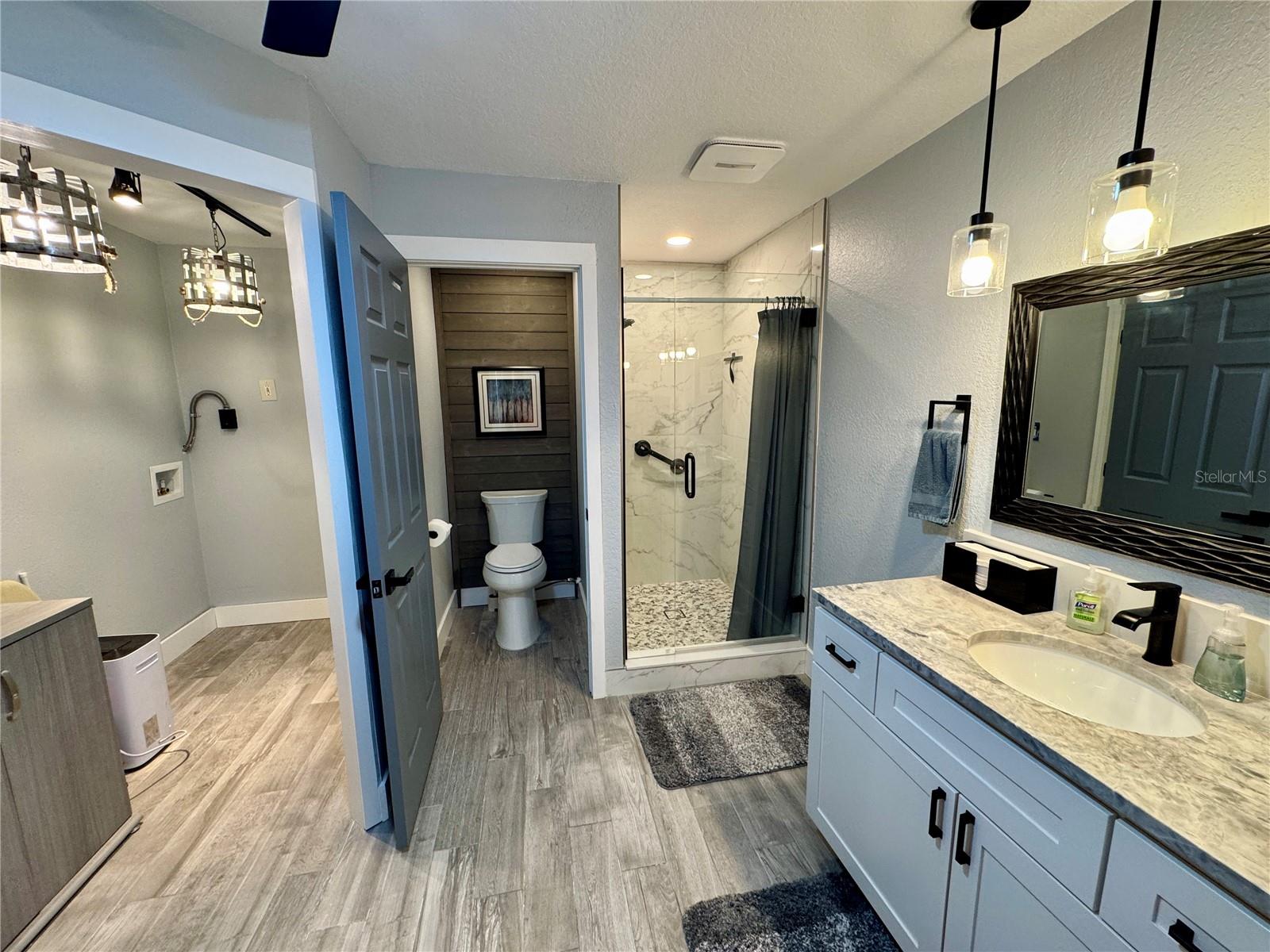 DOWNSTAIRS BATHROOM AND LAUNDRY