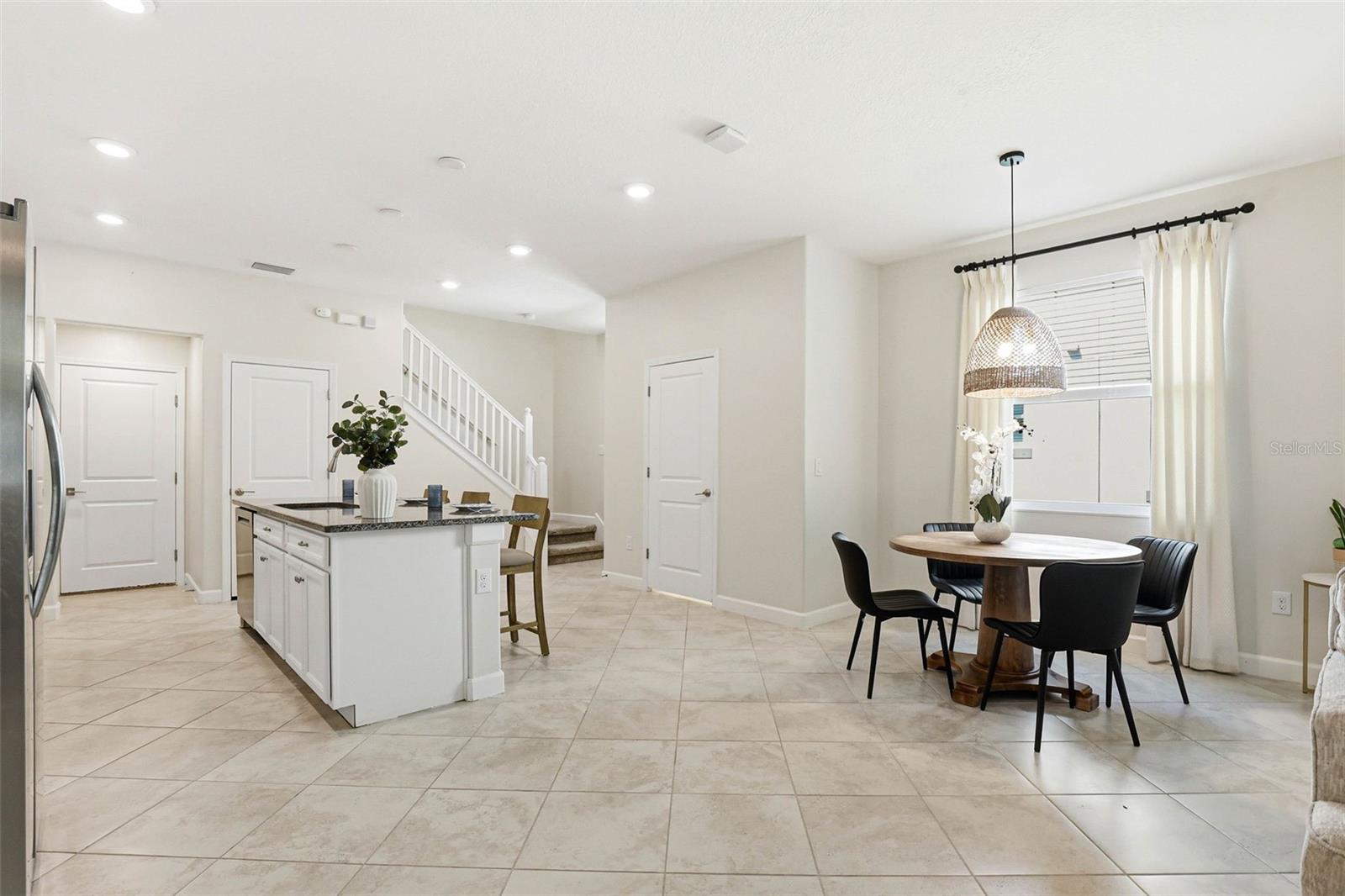 Breakfast table + Kitchen + Staircase