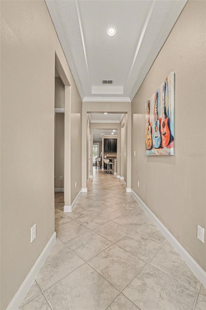 This 14 ft Grand Foyer gives this home a stately entrance and provides separation of the 2nd & 3rd Bedrooms from the rest of the home.