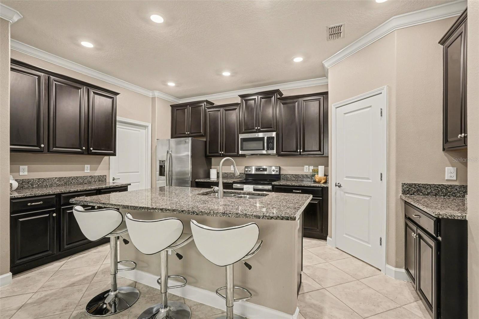 The upgraded cabinets have pull out shelves for easy access to storage