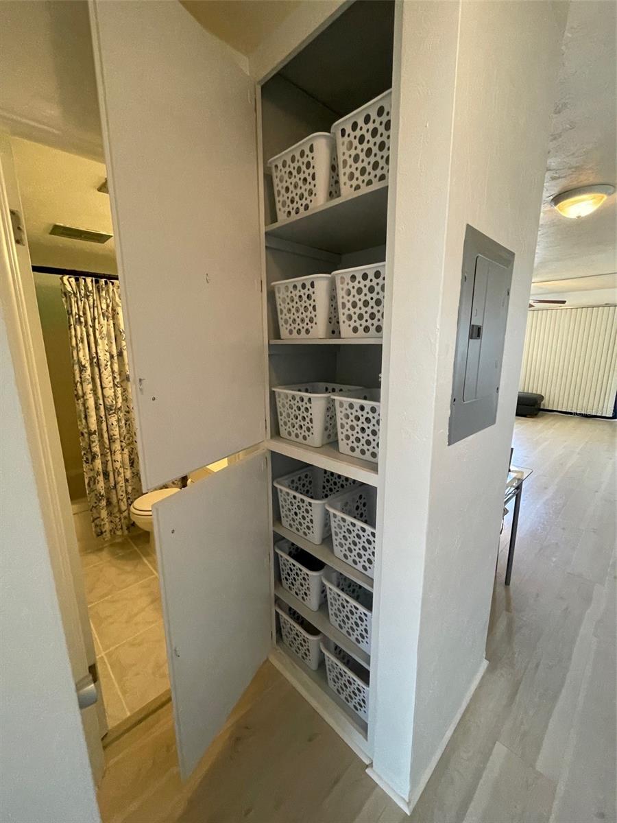 Linen closet by bathroom