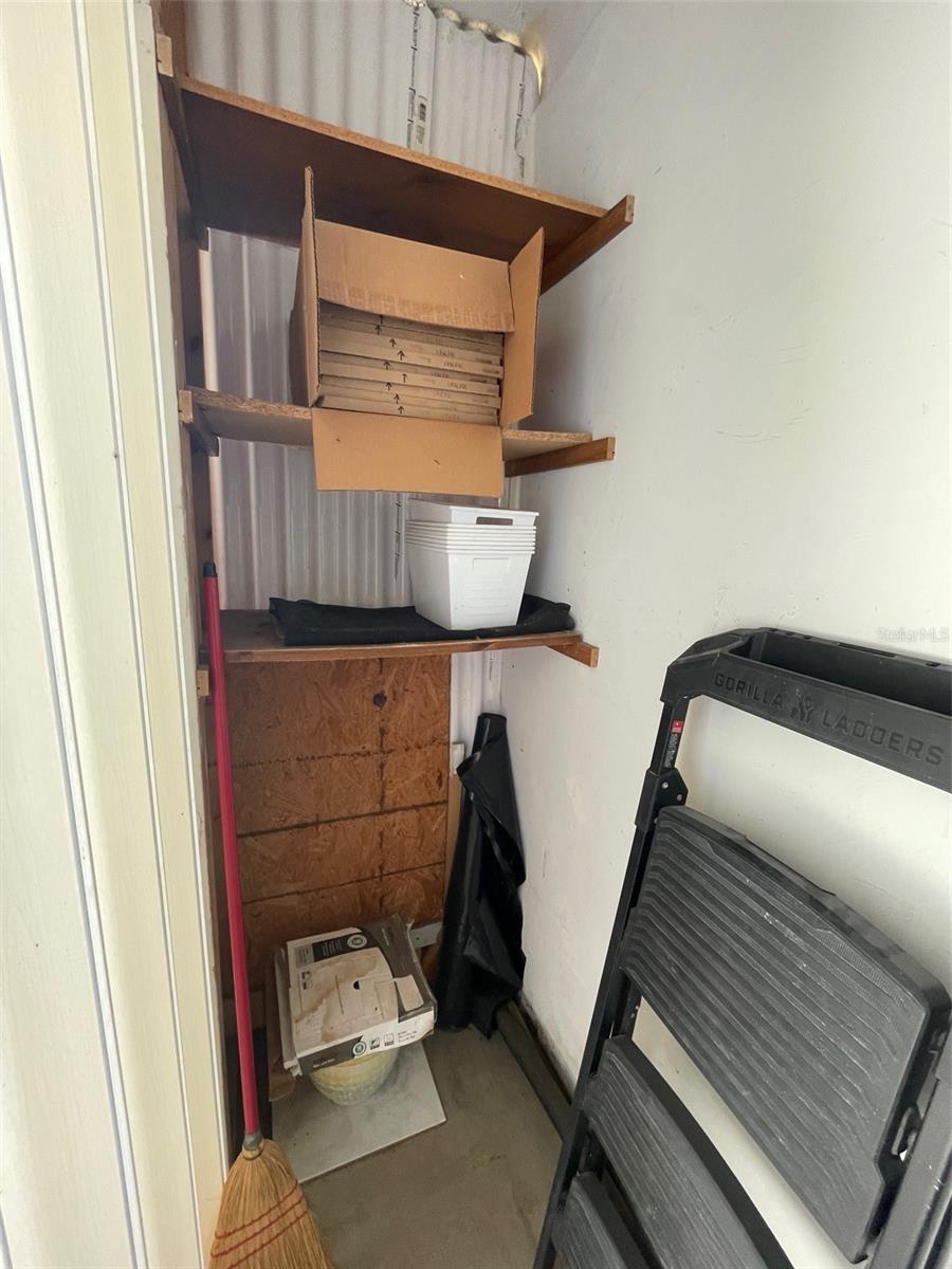 Patio storage has shelving also