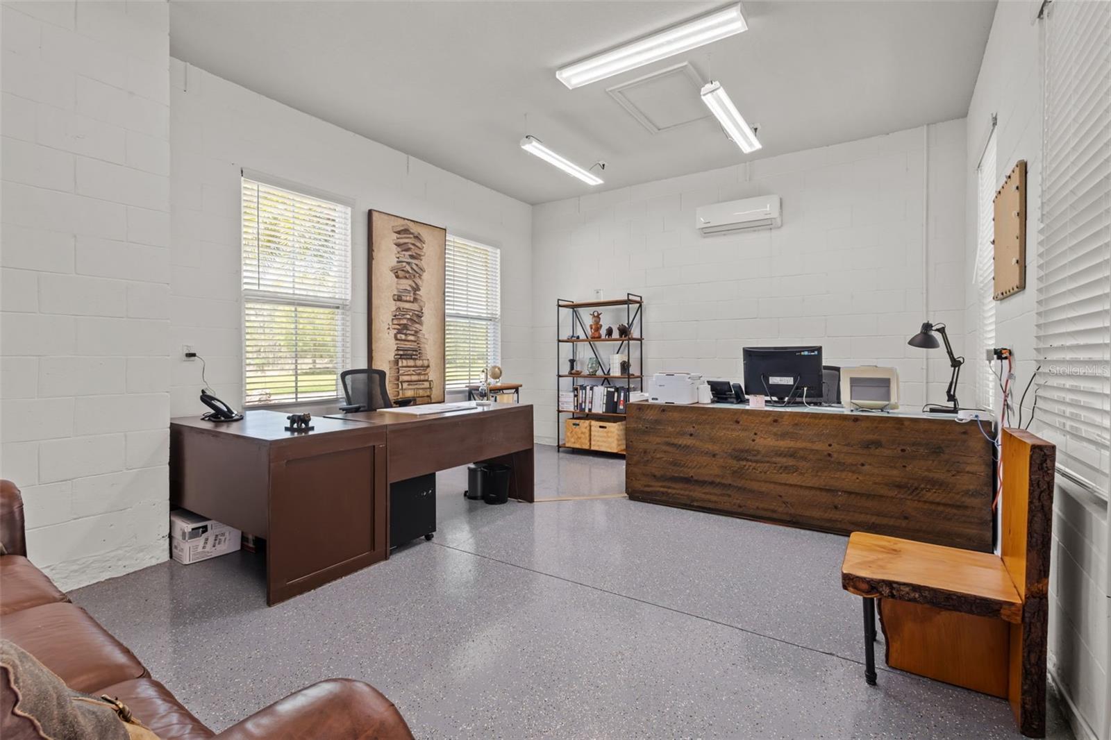 Detached garage with split AC, ideal for office, gym, or workshop.