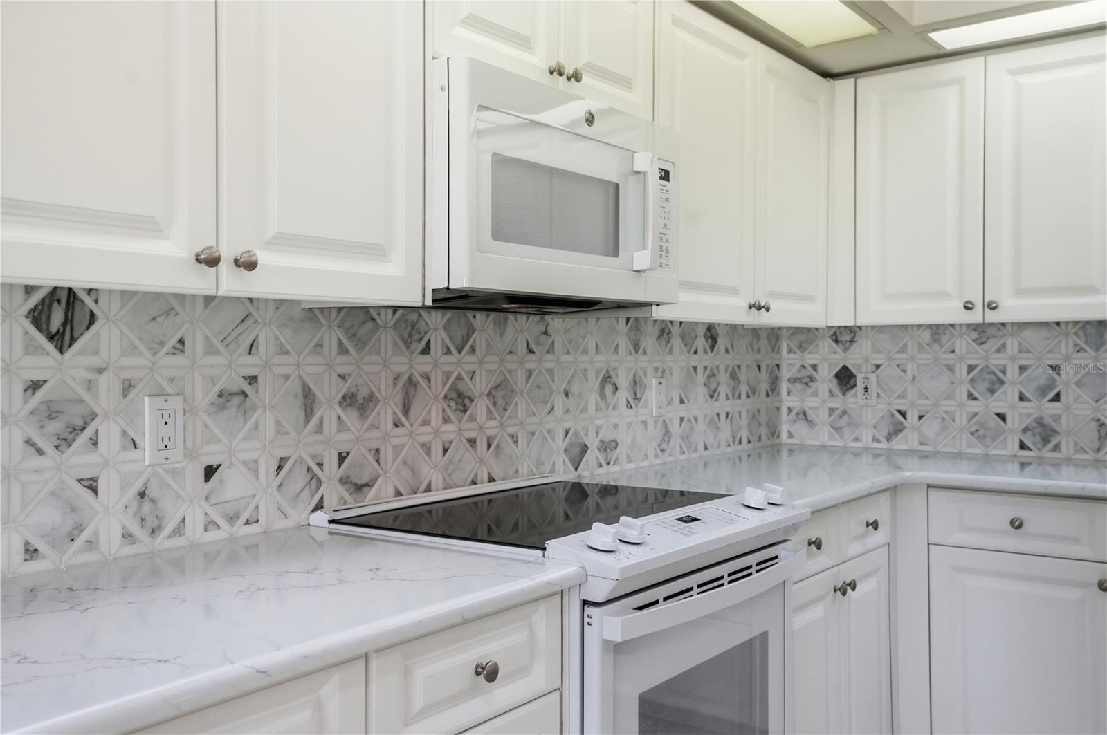 Newer countertops and backsplash.